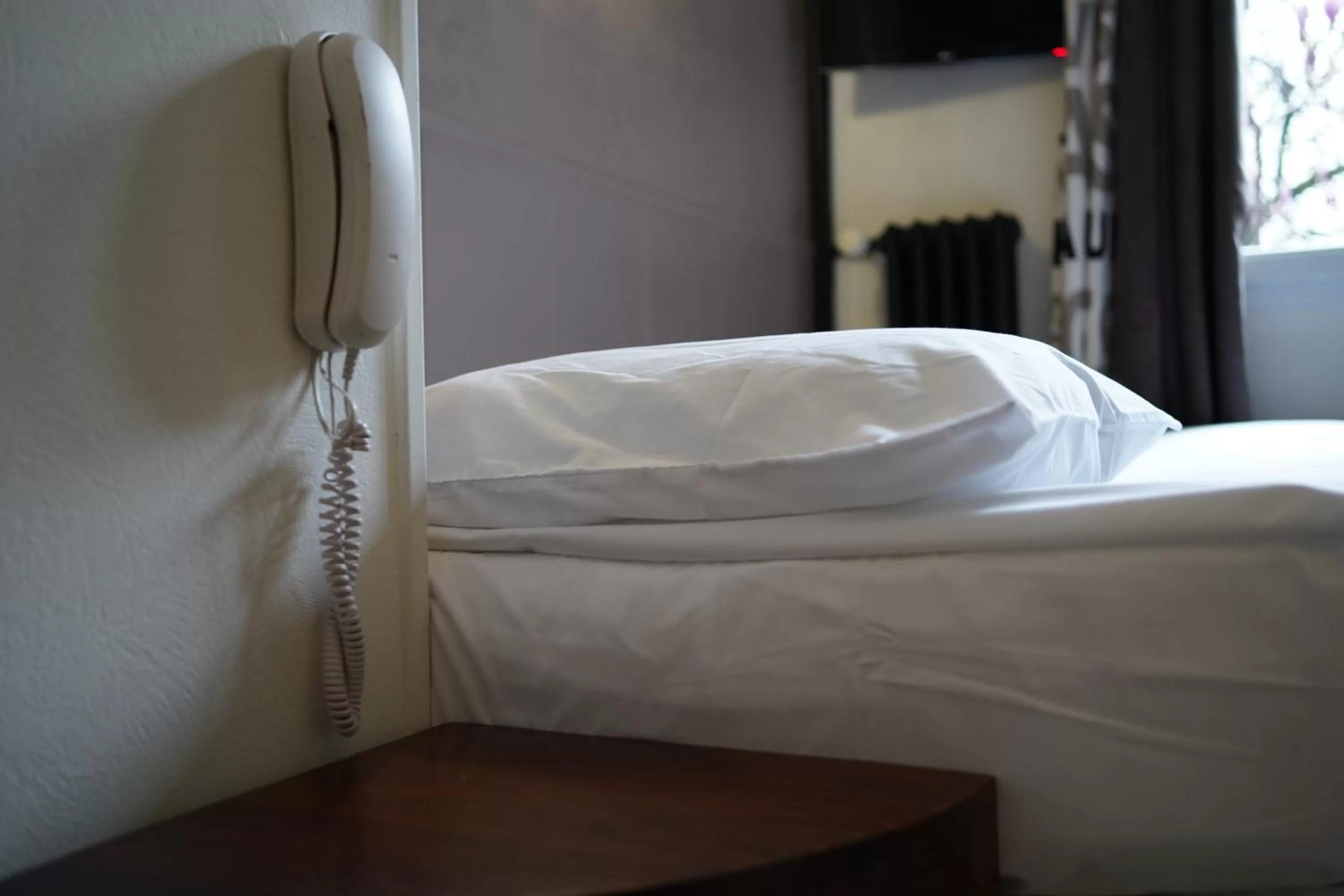 Bed in Hotel De Quebec