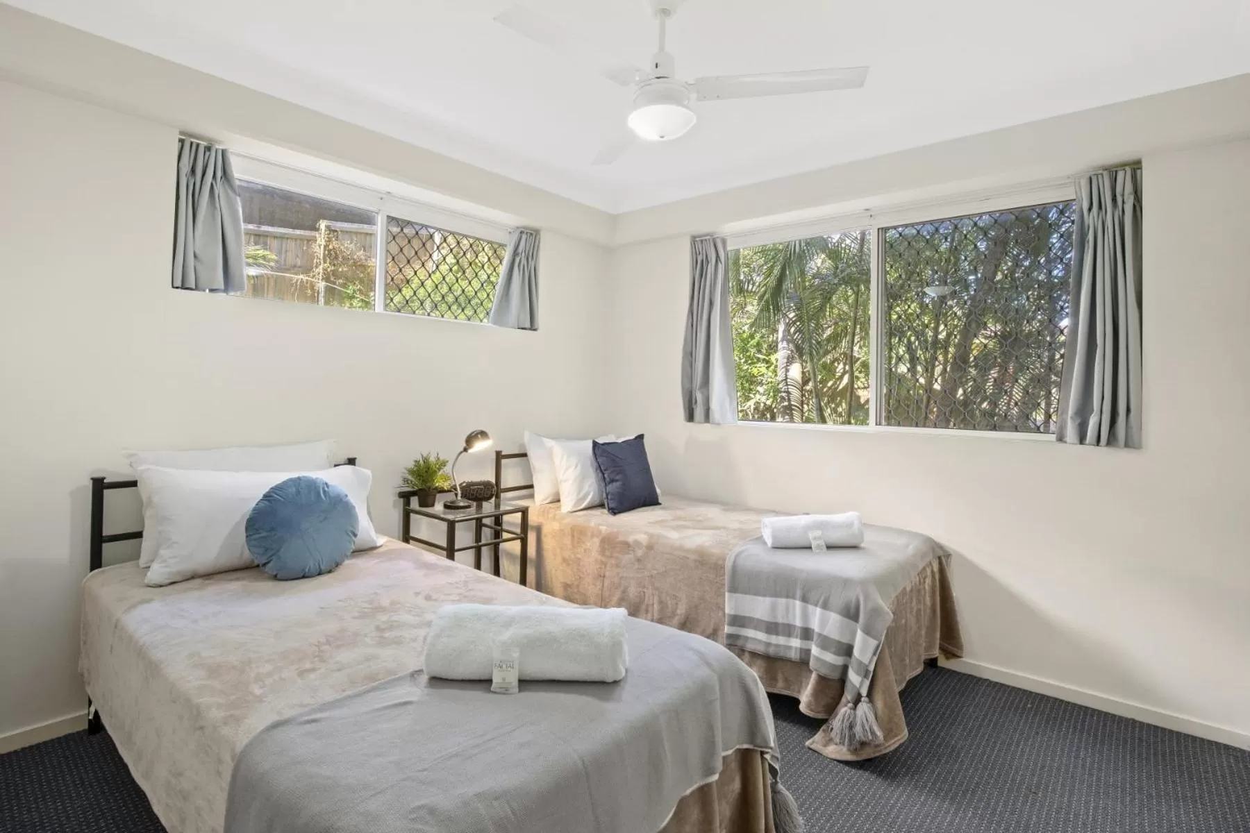 Bed in Kirra Palms Holiday Apartments