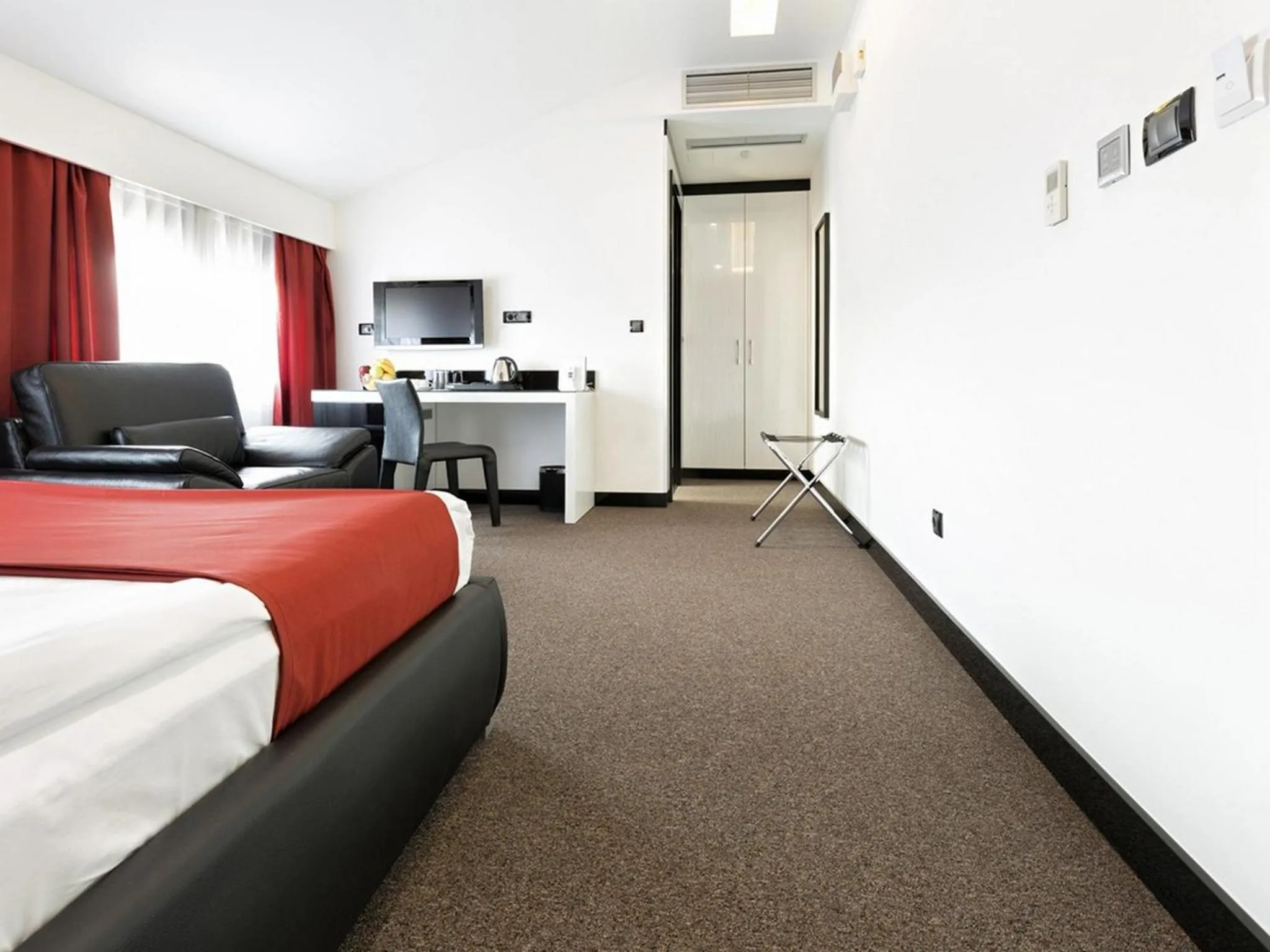 Photo of the whole room, Bed in Nova City Garni Hotel Signature Collection