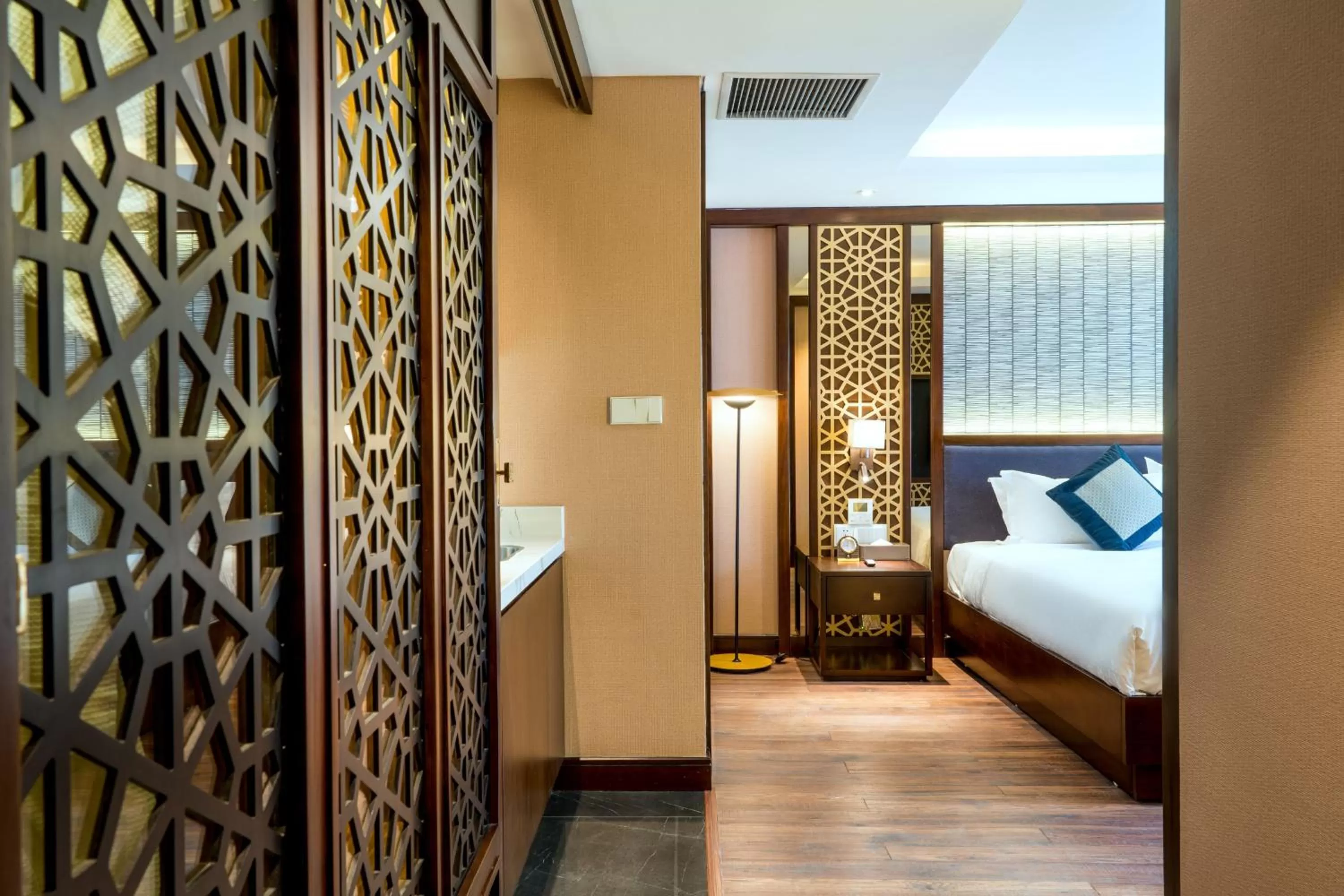 wardrobe, Bed in Conifer Grand Hotel