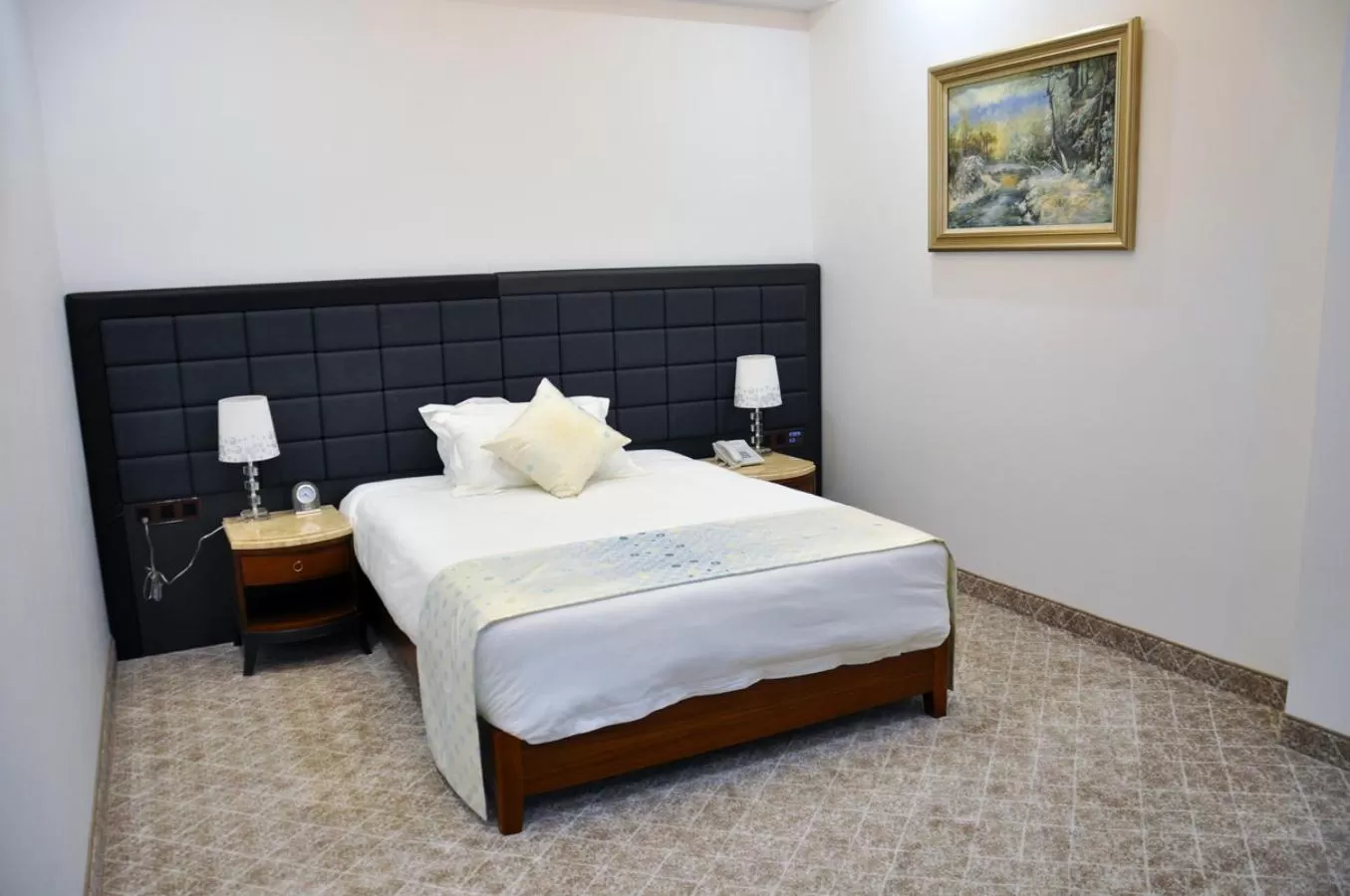 Bed in Parliament Palace Hotel