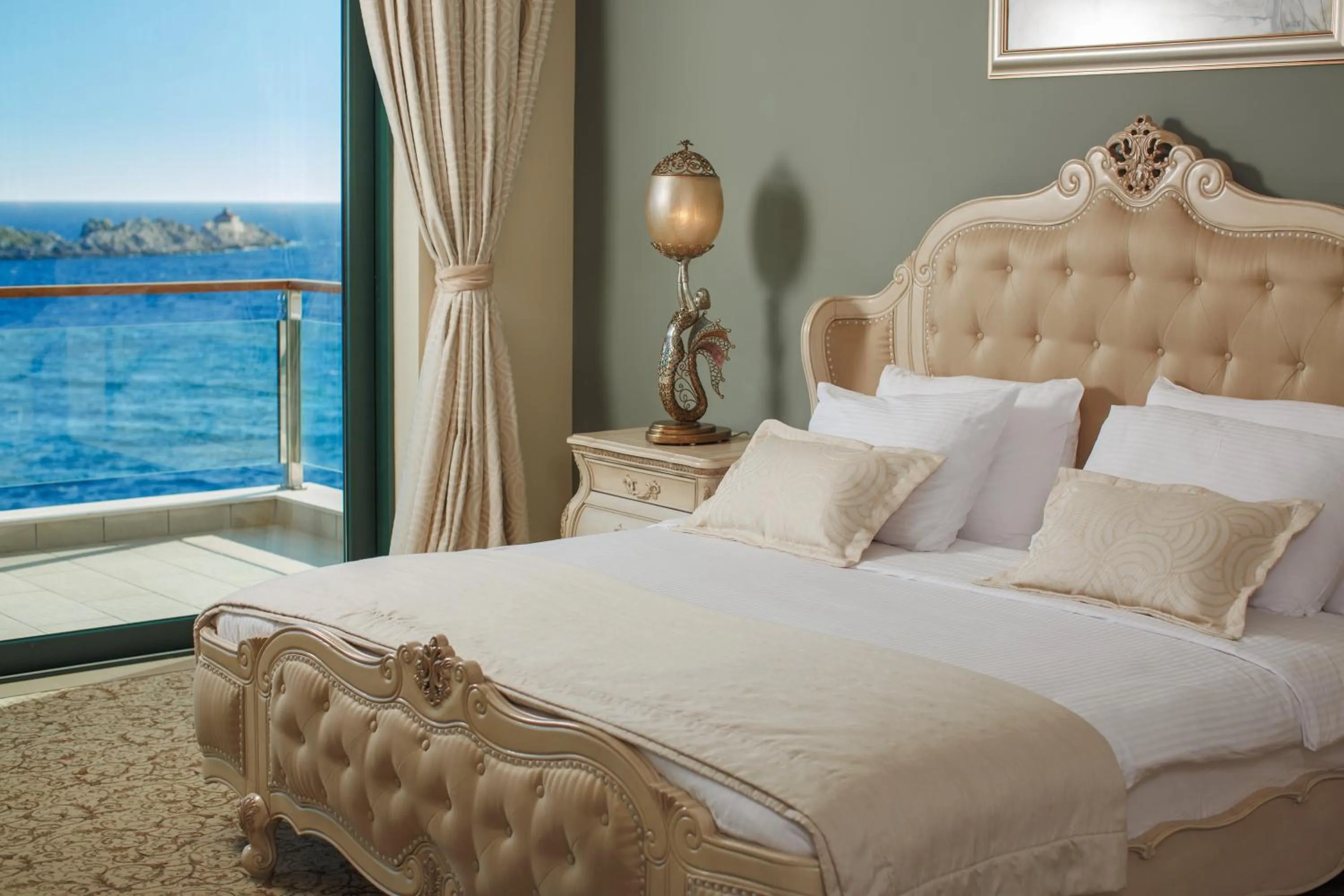 Bed in Royal Princess Hotel