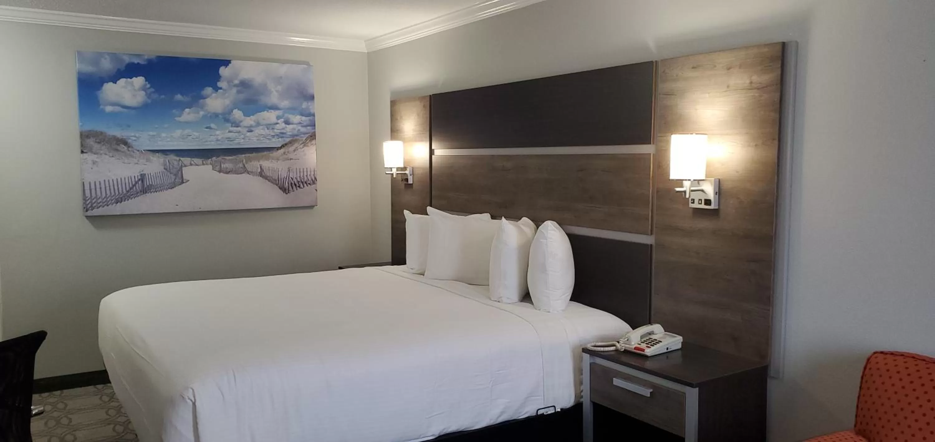 Bed in Ambassador Inn and Suites