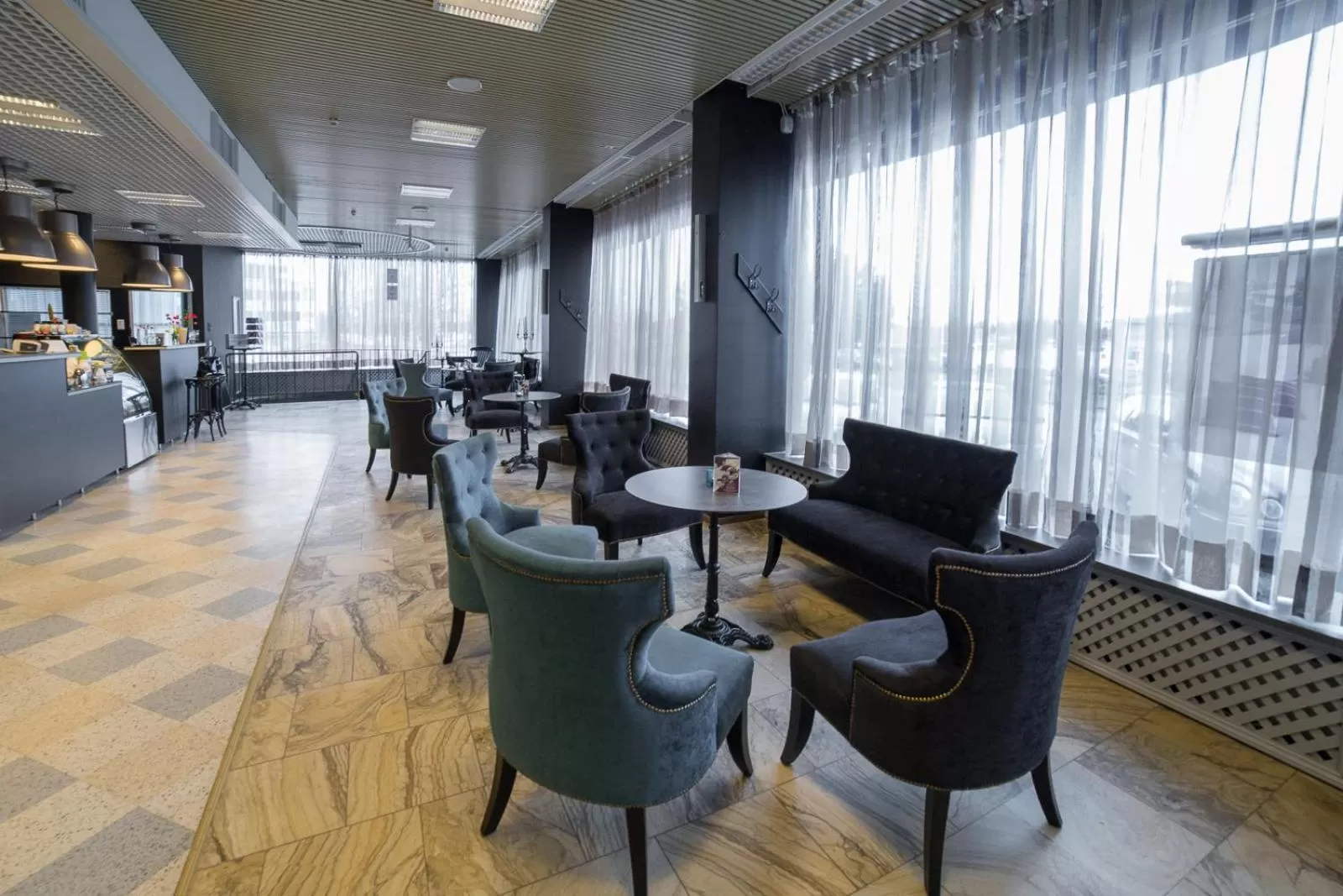 Communal lounge/ TV room in Hotelli Olof