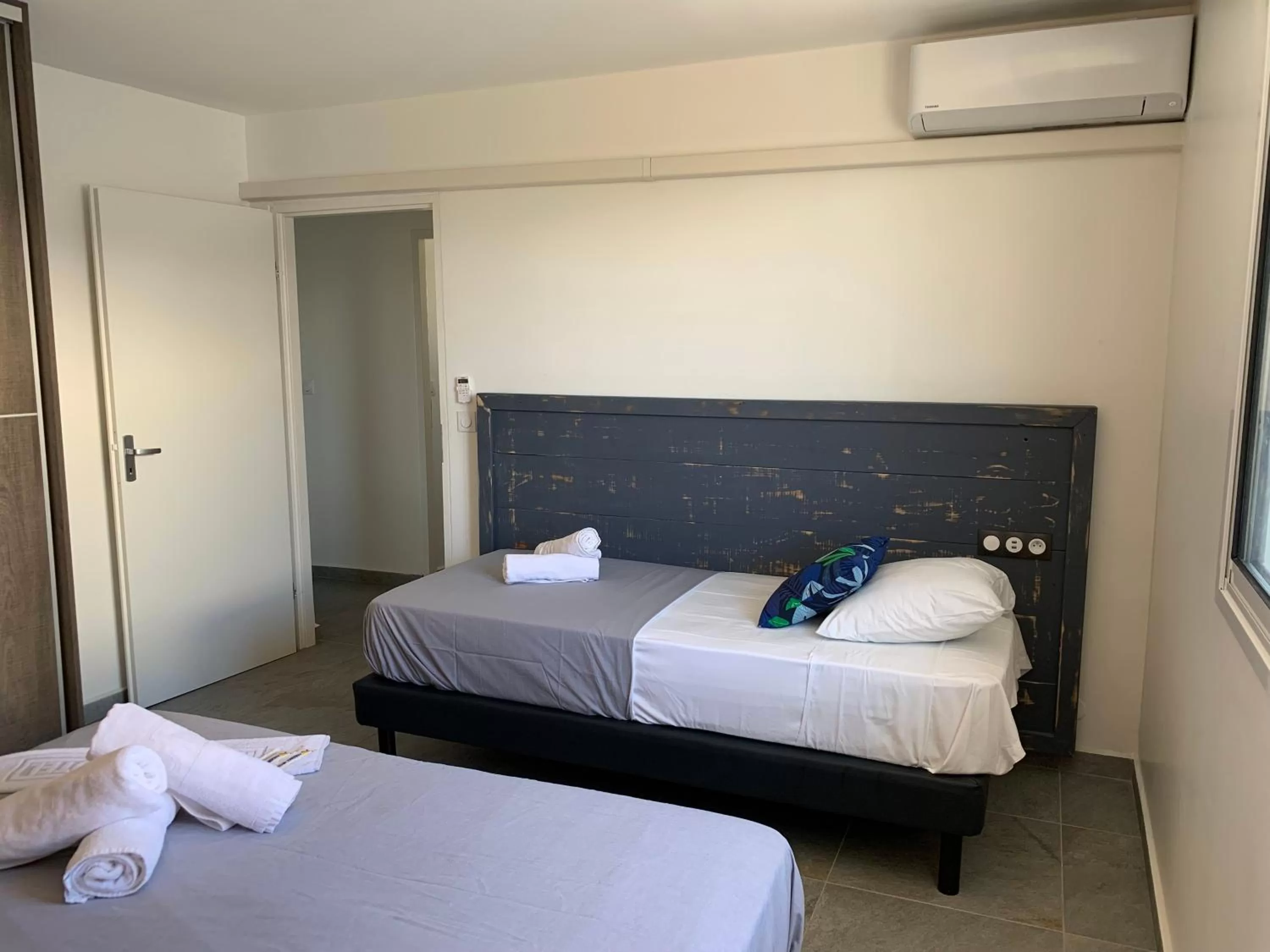 Bed in Karaibes Residence