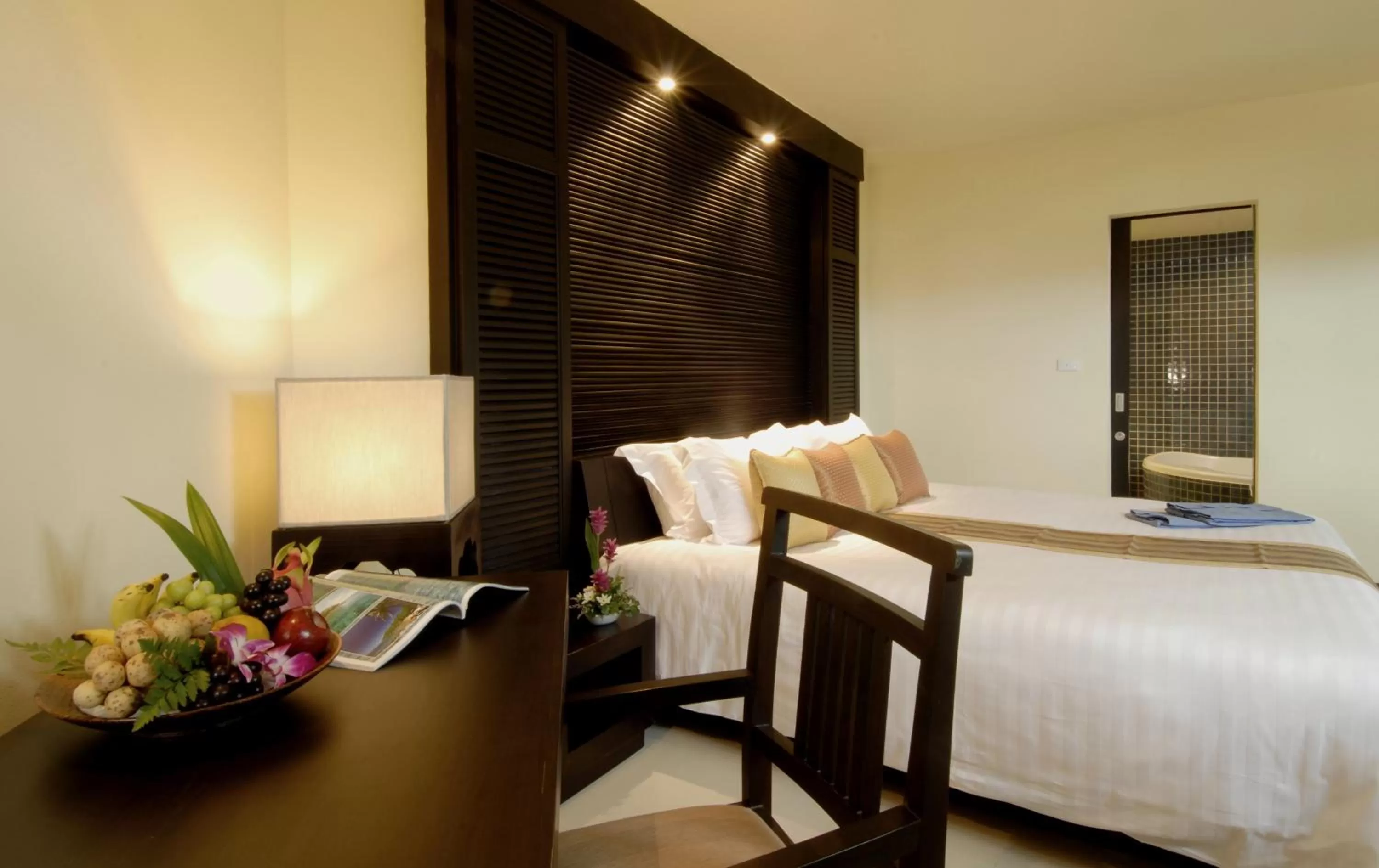 Bed in The Nouveau Chumphon Beach Resort And Golf