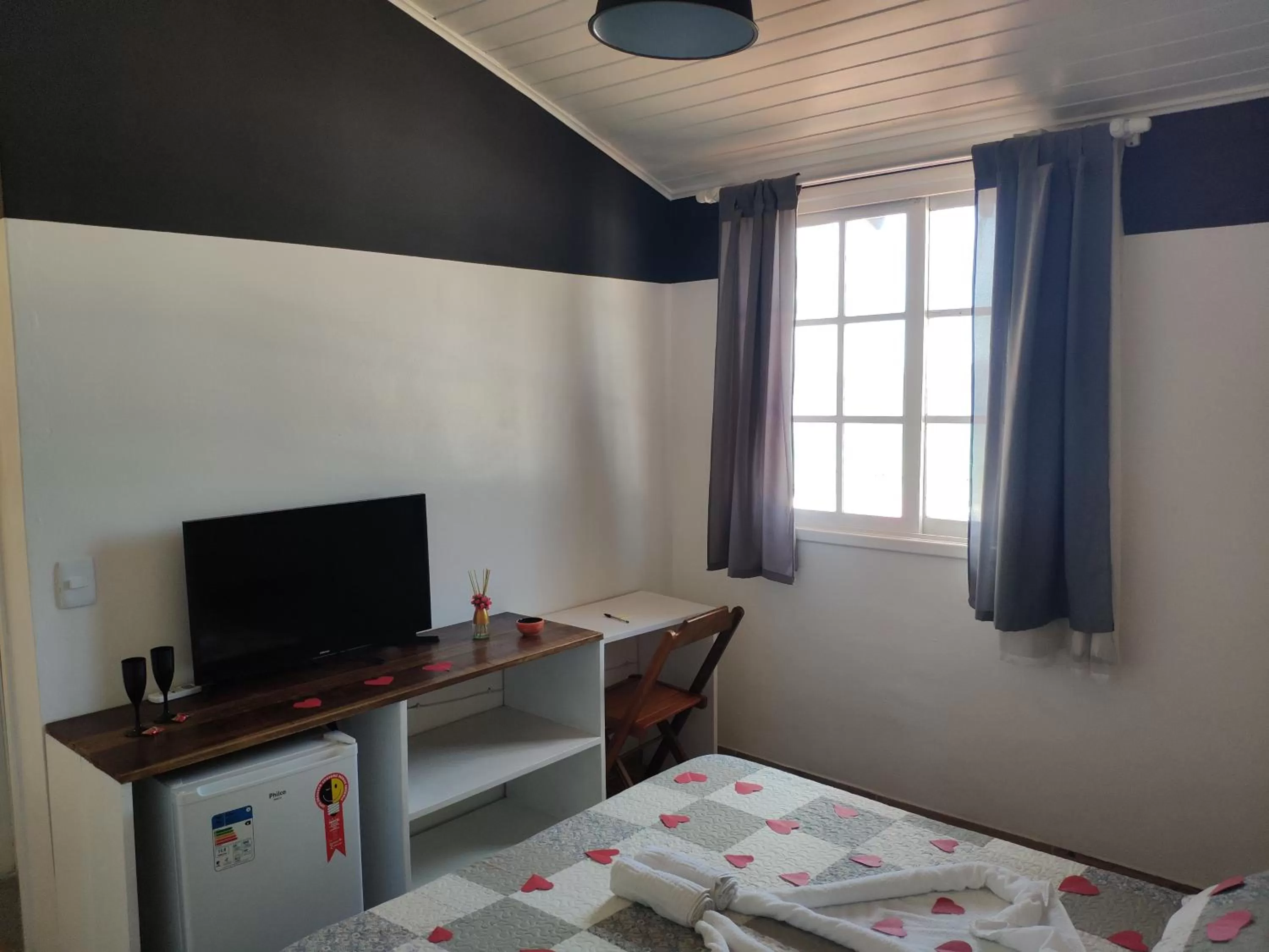 TV/Entertainment Center in Casa de Hóspedes "Guesthouse Prainha"