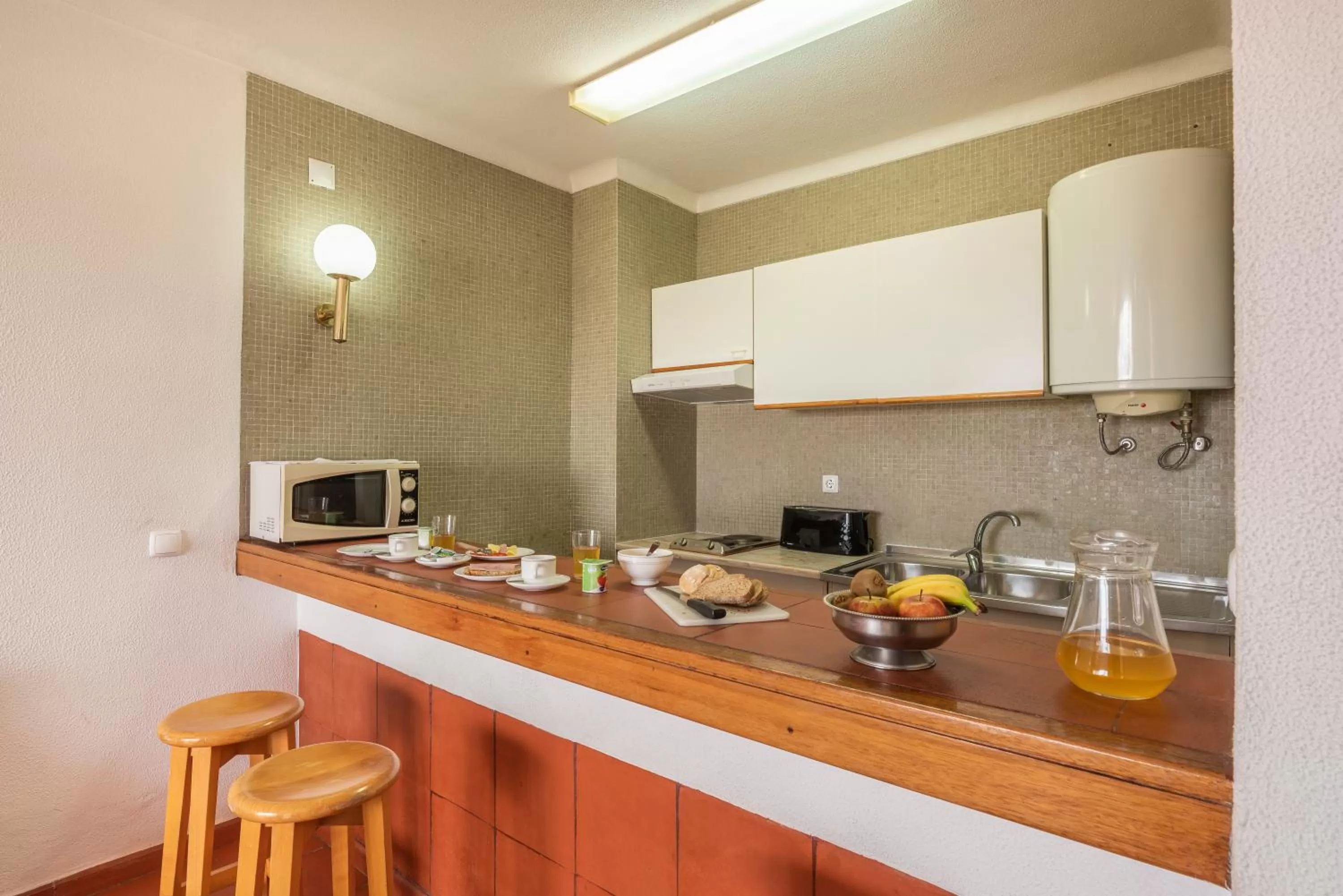 Kitchen or kitchenette in Aparthotel Navigator