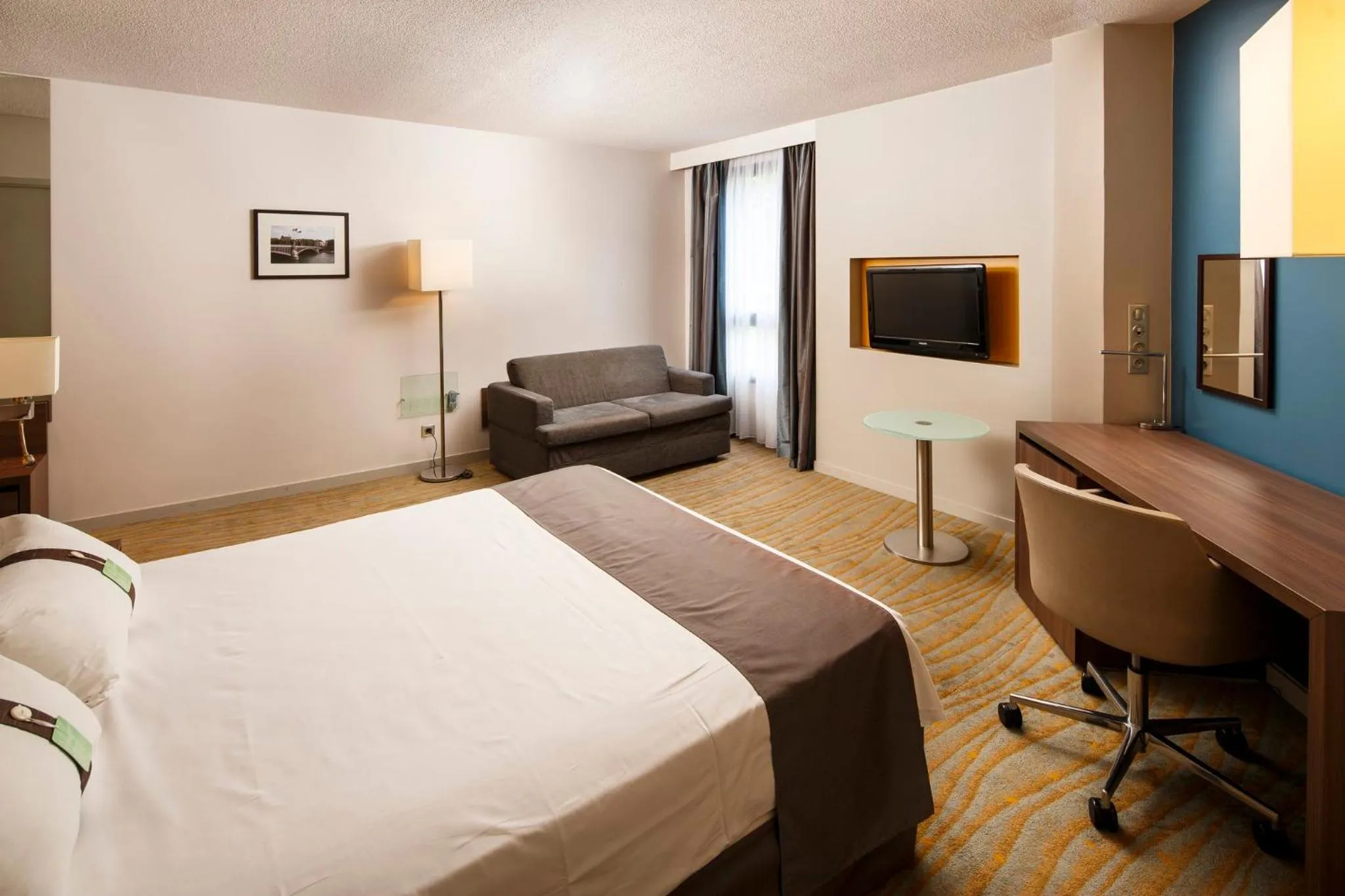 Photo of the whole room, Bed in Holiday Inn Lyon Vaise by IHG