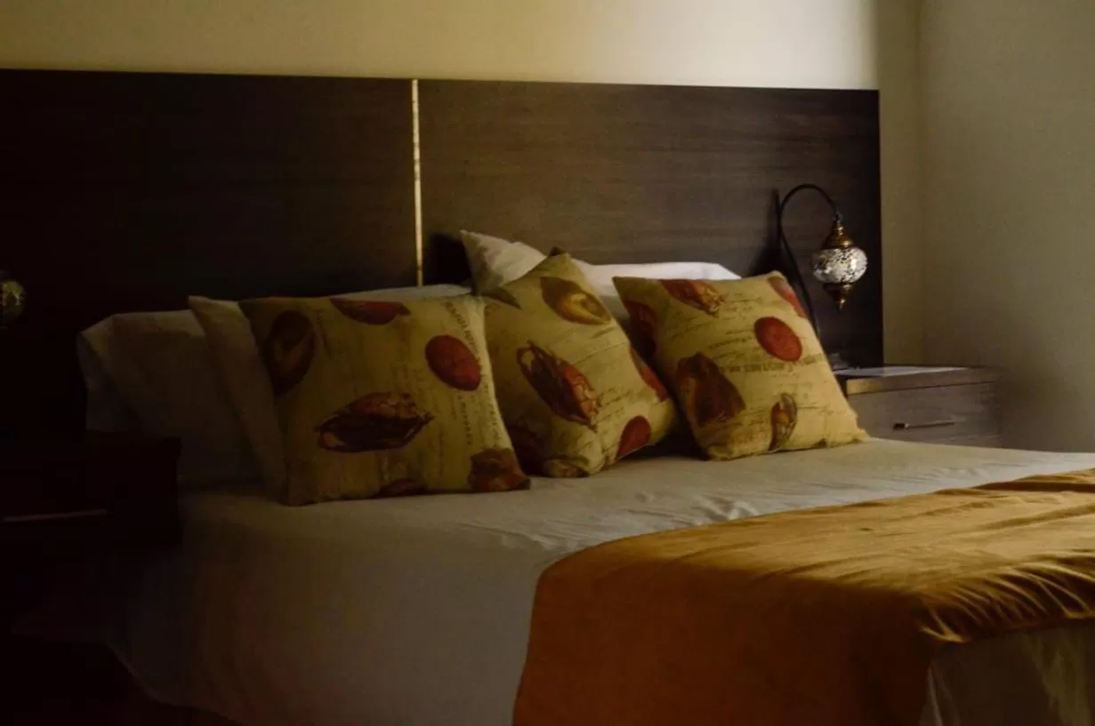 Bed in Porto Bello Hotel Boutique