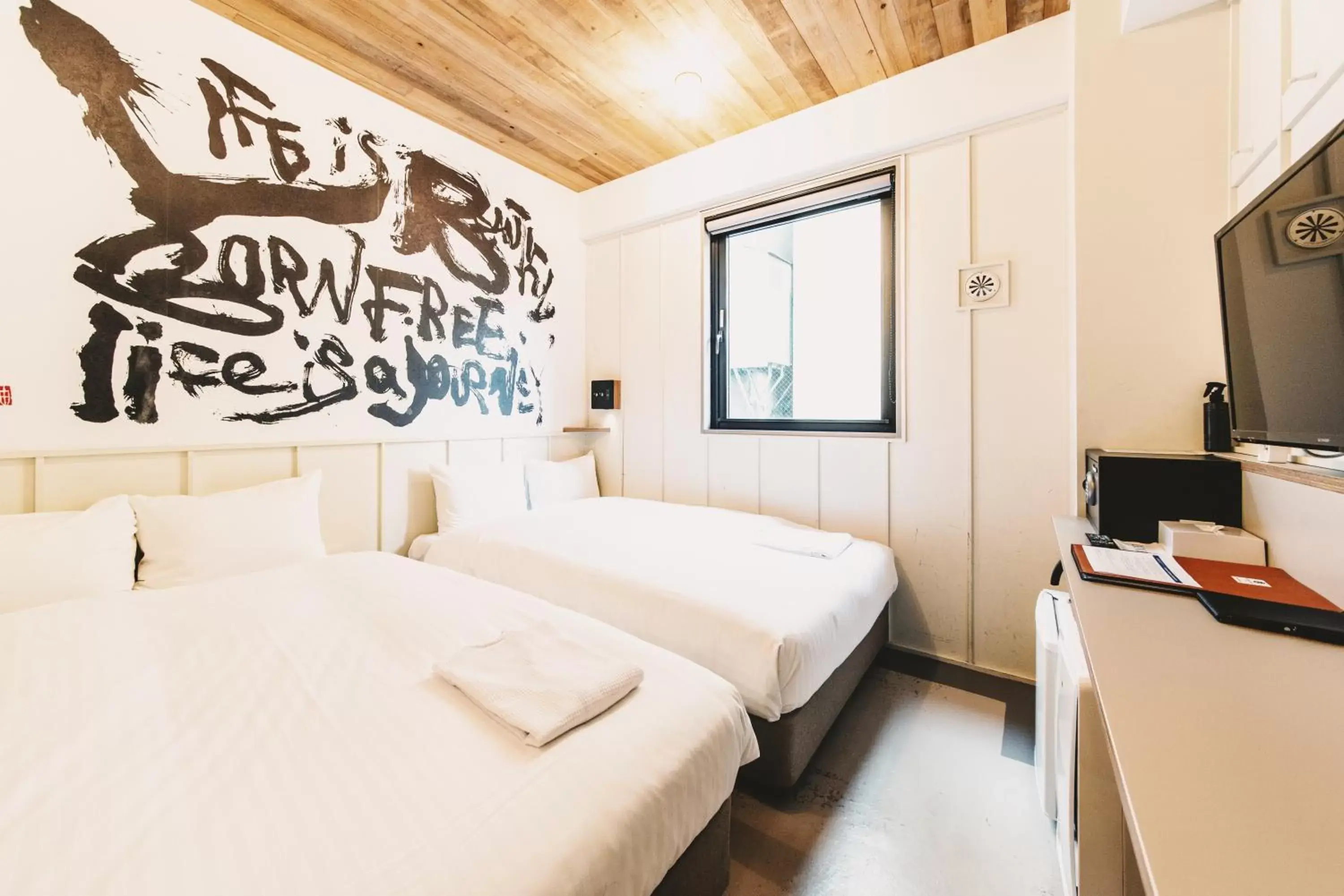 Compact Quadruple Room - 2 Small Double Beds in Kamon Hotel Namba Compact Quadruple Room - 2 Small Double Beds in Kamon Hotel Namba