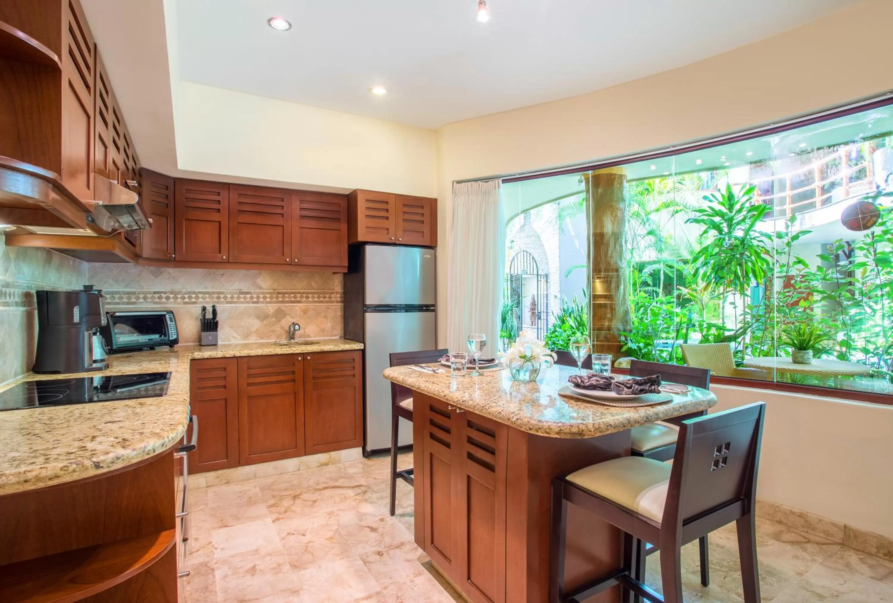 Kitchen or kitchenette in Maya Villa Condo Hotel and Beachclub