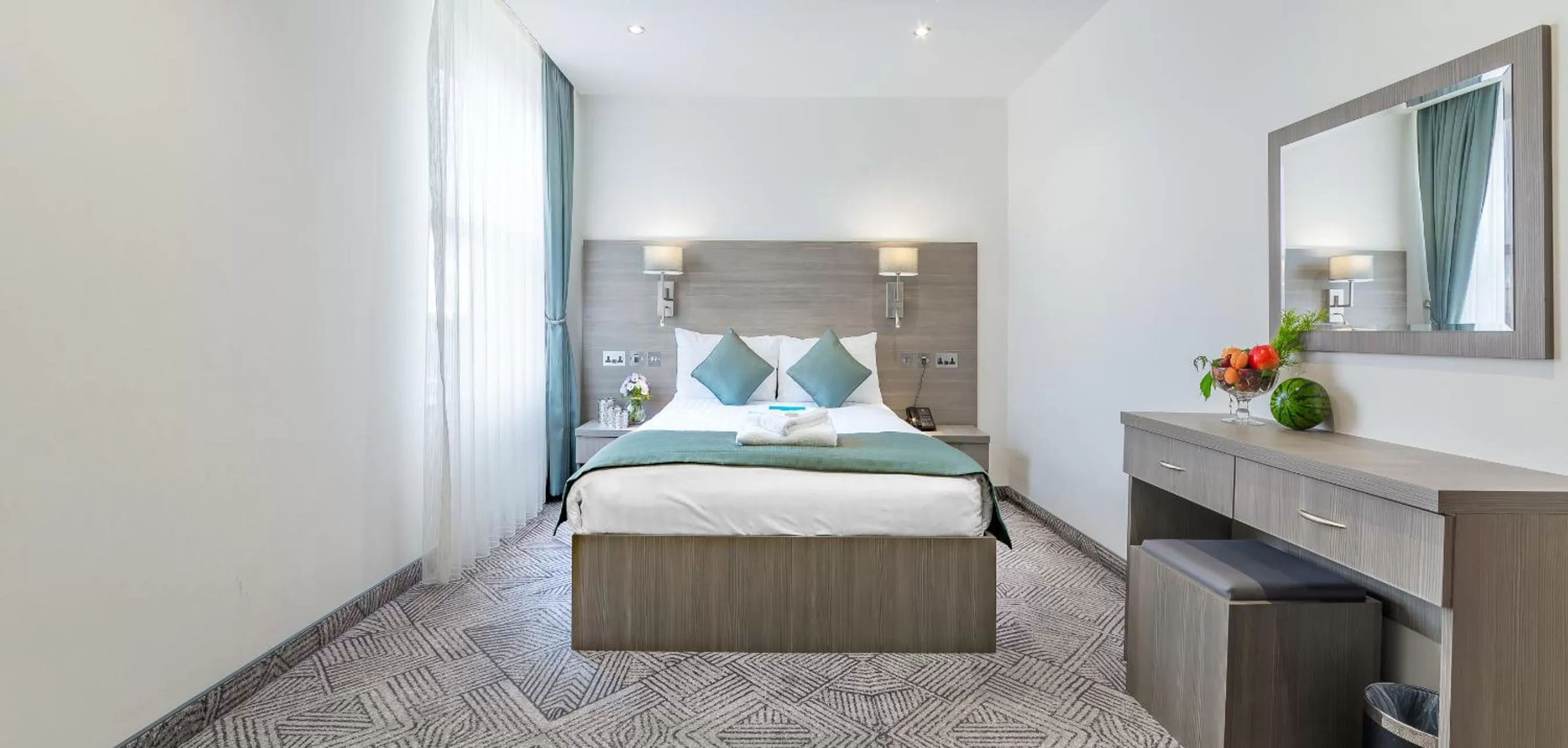 Bed in The Lion & Key Hotel