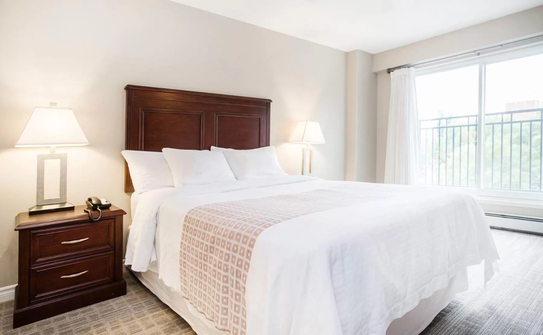 Bed in Canterra Suites Hotel