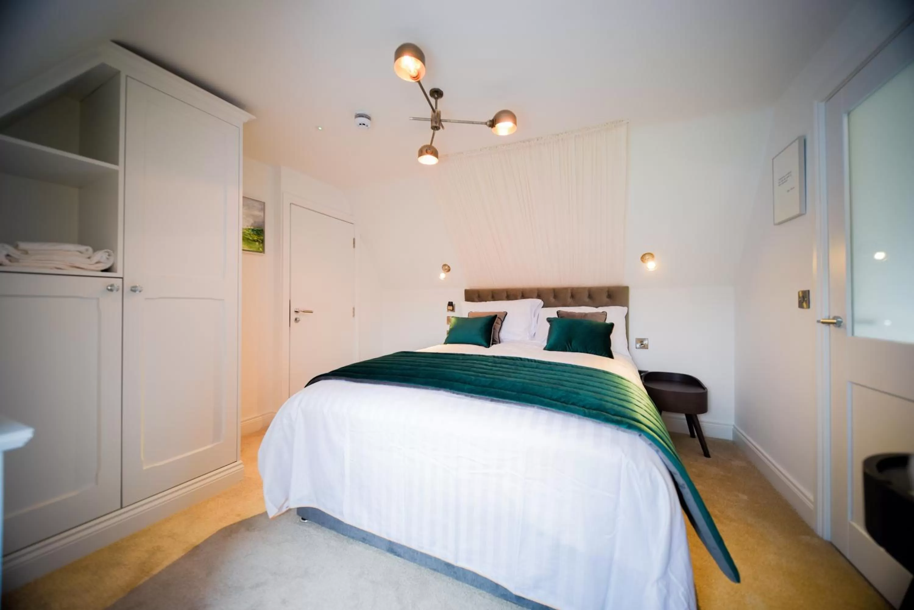 Photo of the whole room, Bed in The Strand Hotel, the former residence of Oscar Wilde