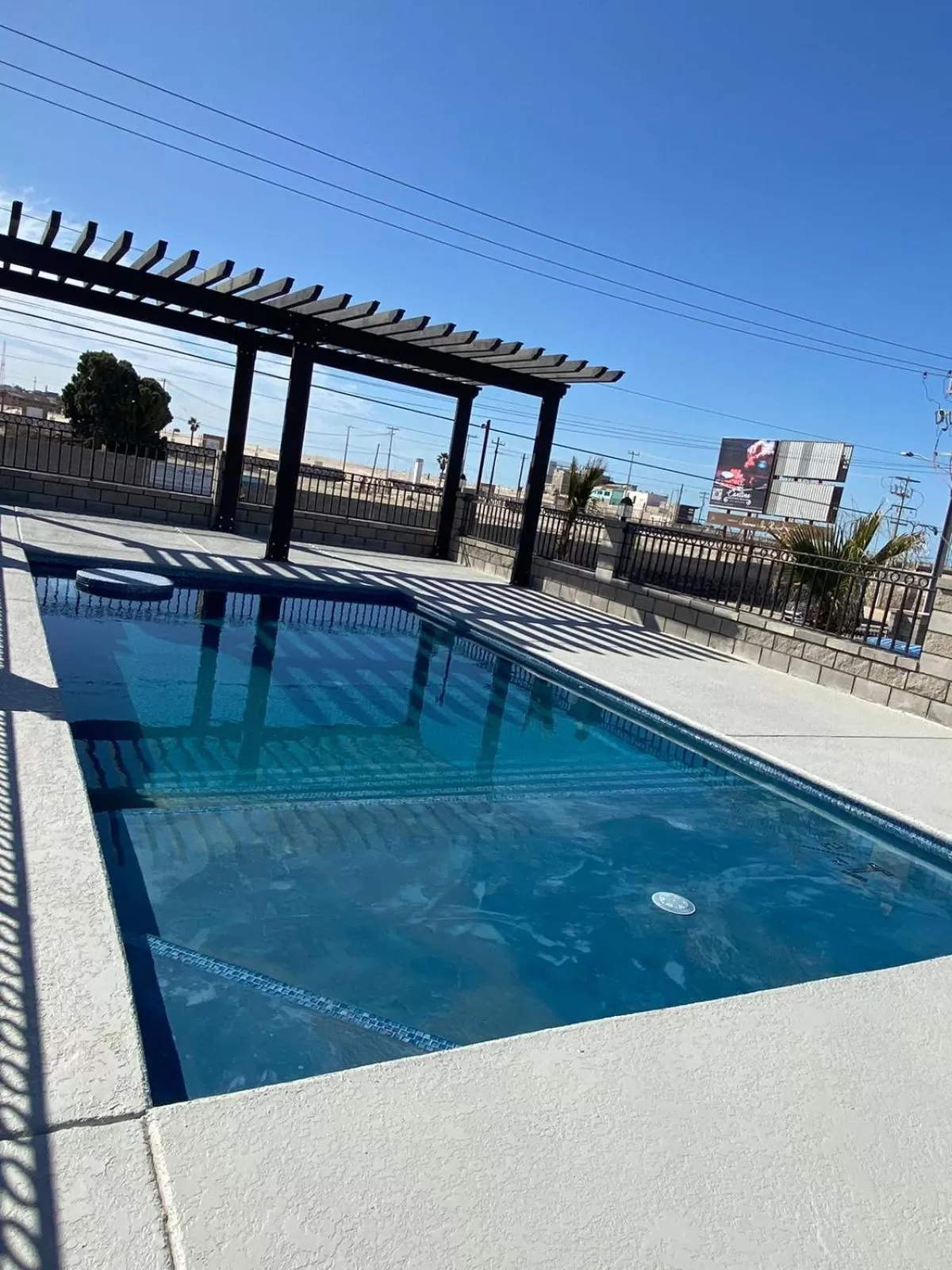 Swimming pool in Playas Hotel Suites