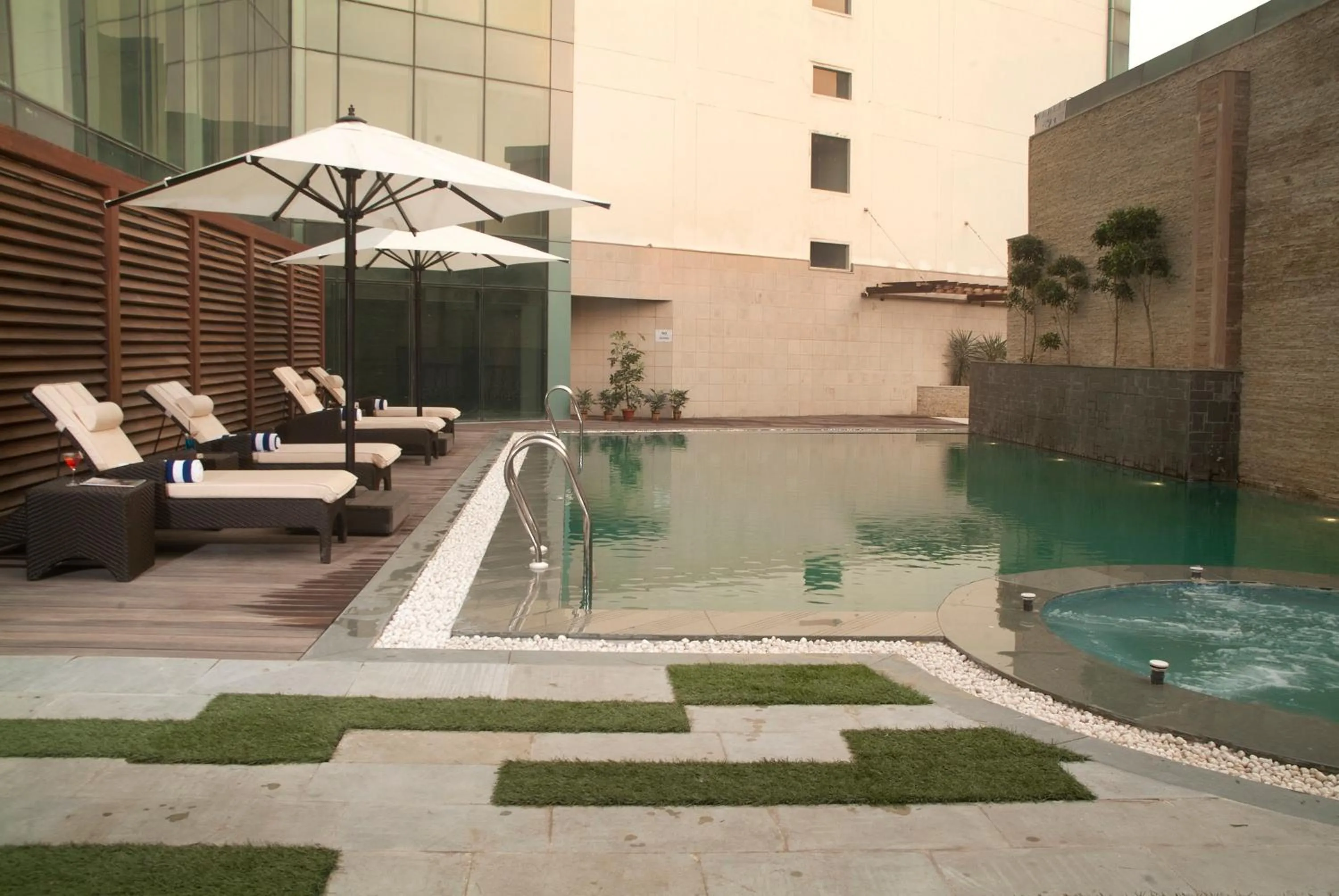 Swimming pool in Savoy Suites Greater Noida