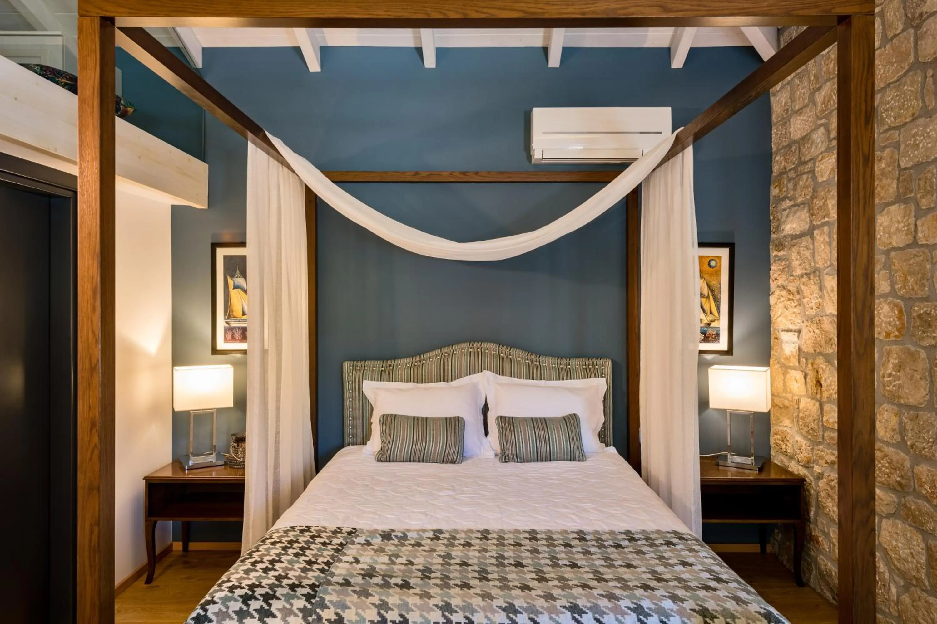 Bed in Anthemion Suites and Villas