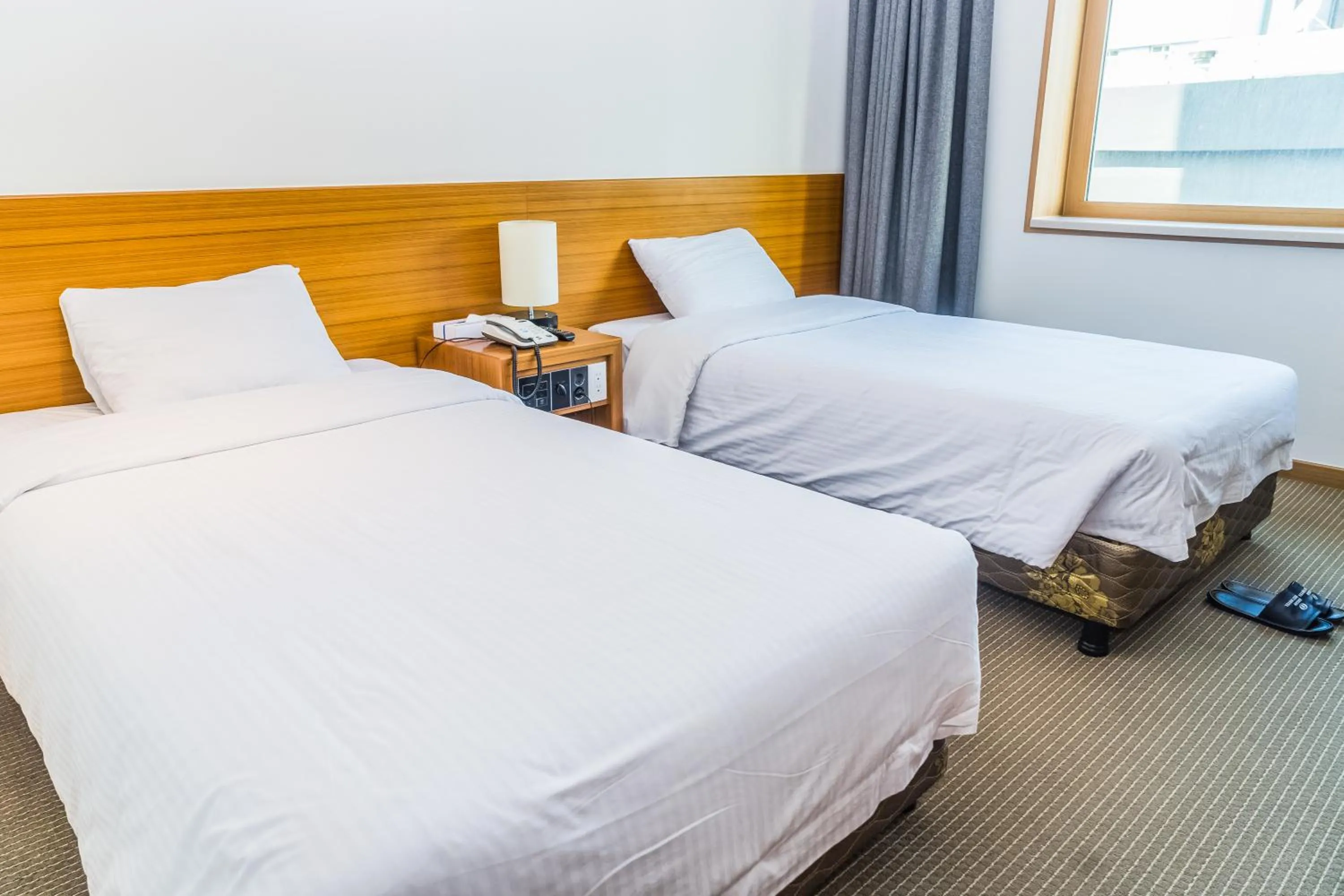 Bedroom, Bed in Busan Tourist Hotel