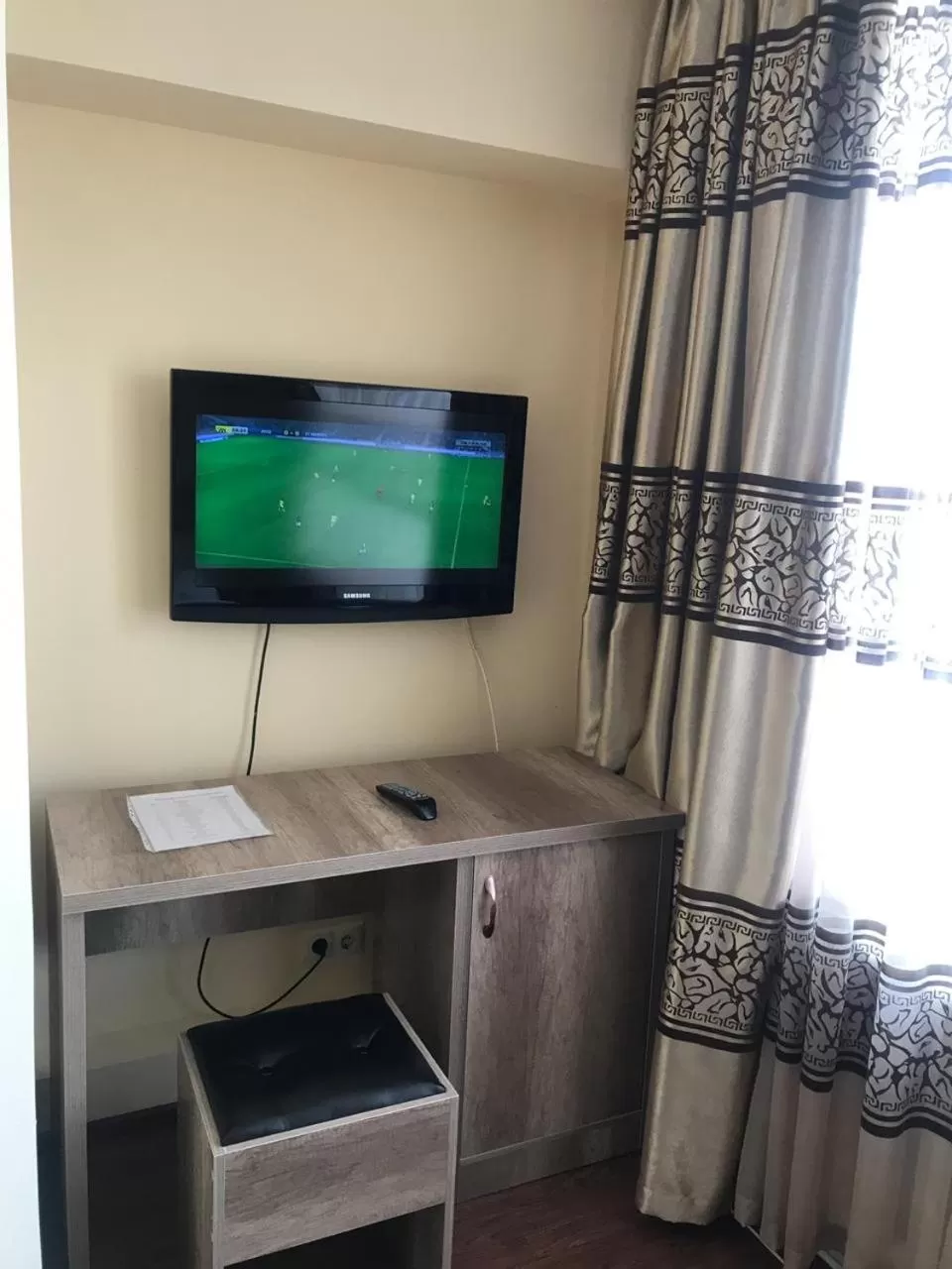 TV/Entertainment Center in Altai Business Hotel