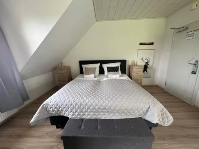 Bed in Hotel Rehkitz