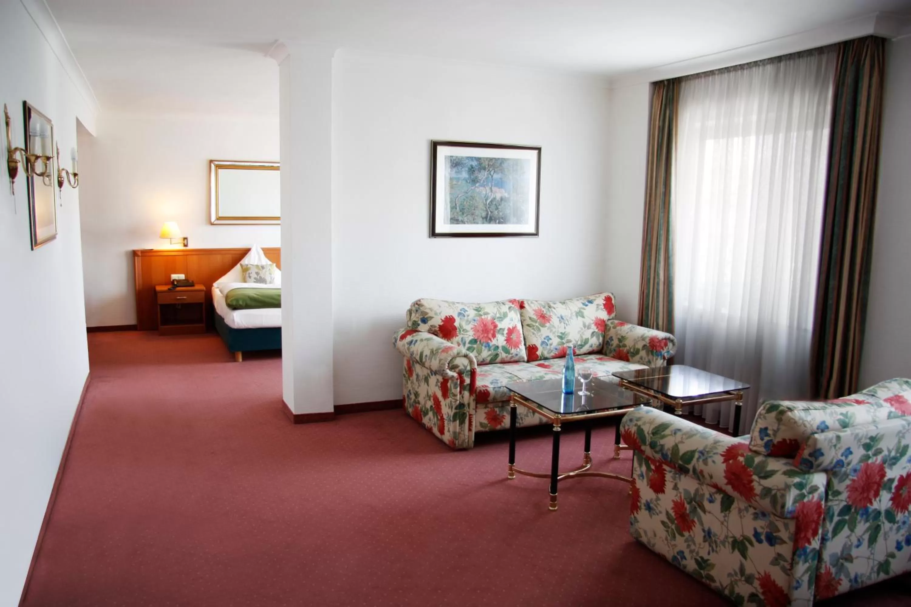 Living room, Bed in INA Hotel Royal