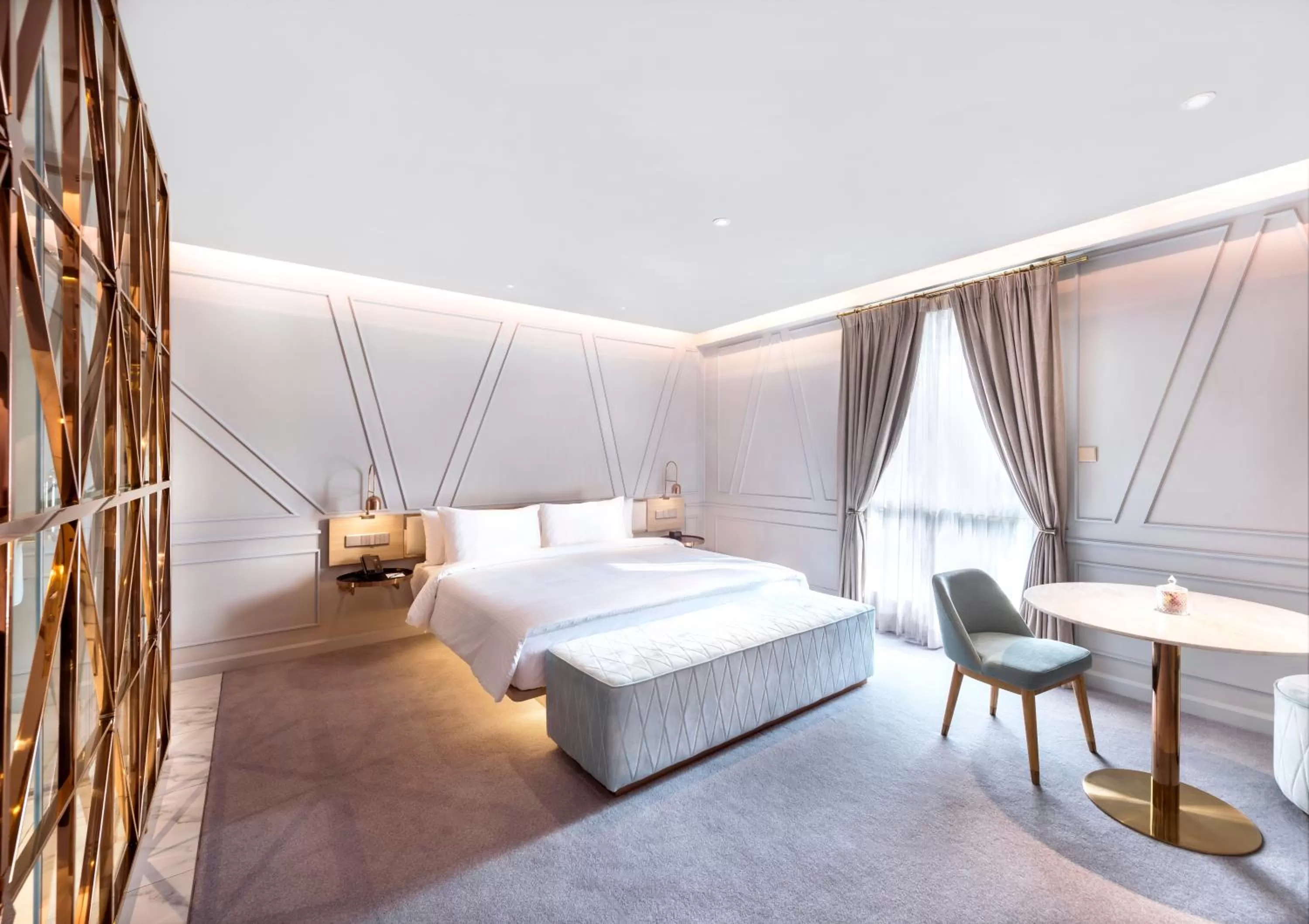 Bed in The Prestige Hotel Penang, a Member of Design Hotels