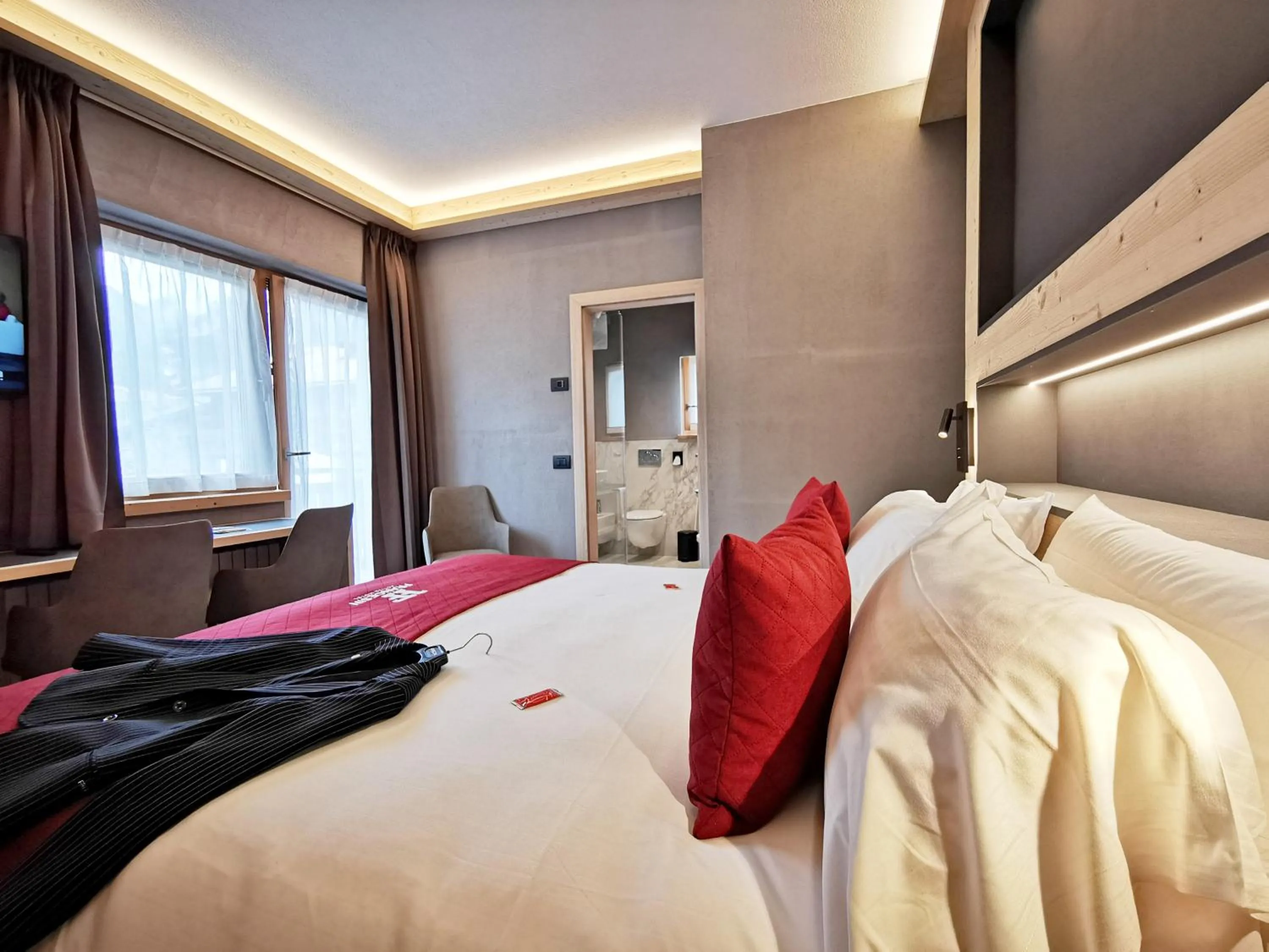 Bed in Francesin Active Hotel