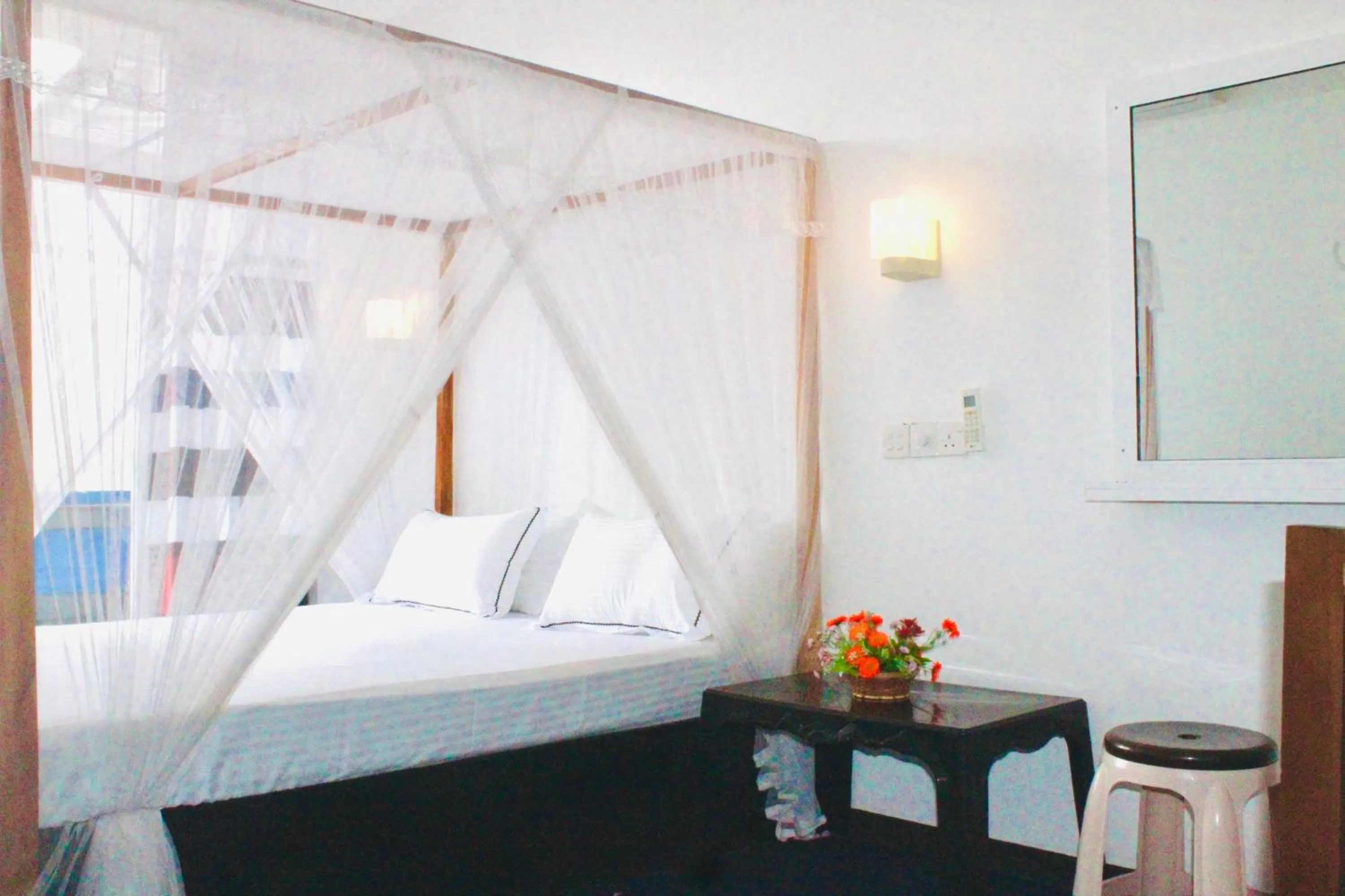 Bed in Surasa Beach Resort
