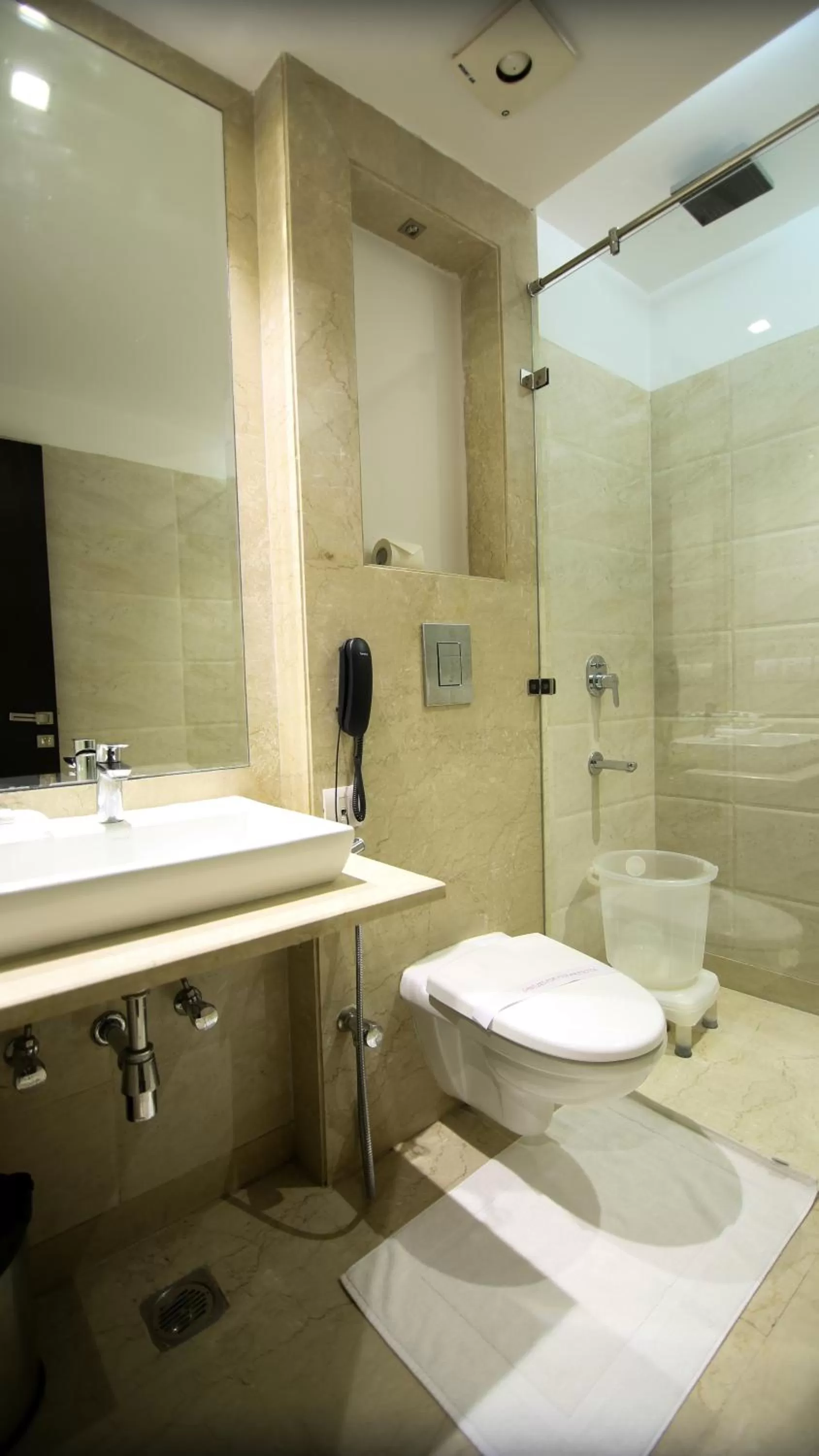 Bathroom in Hotel The Prime Balaji Deluxe, City Centre, With Free Airport Pickup