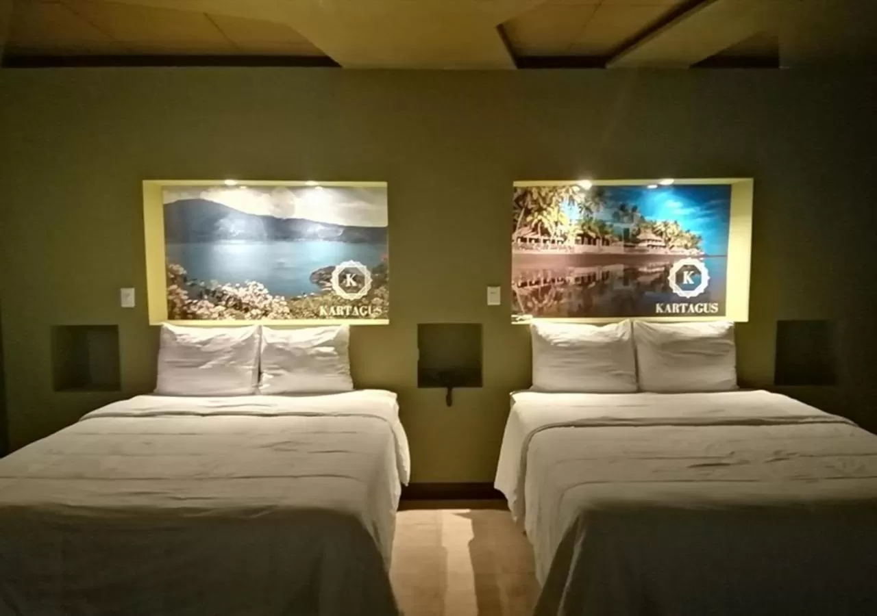 Bed in Kartagus Hotel