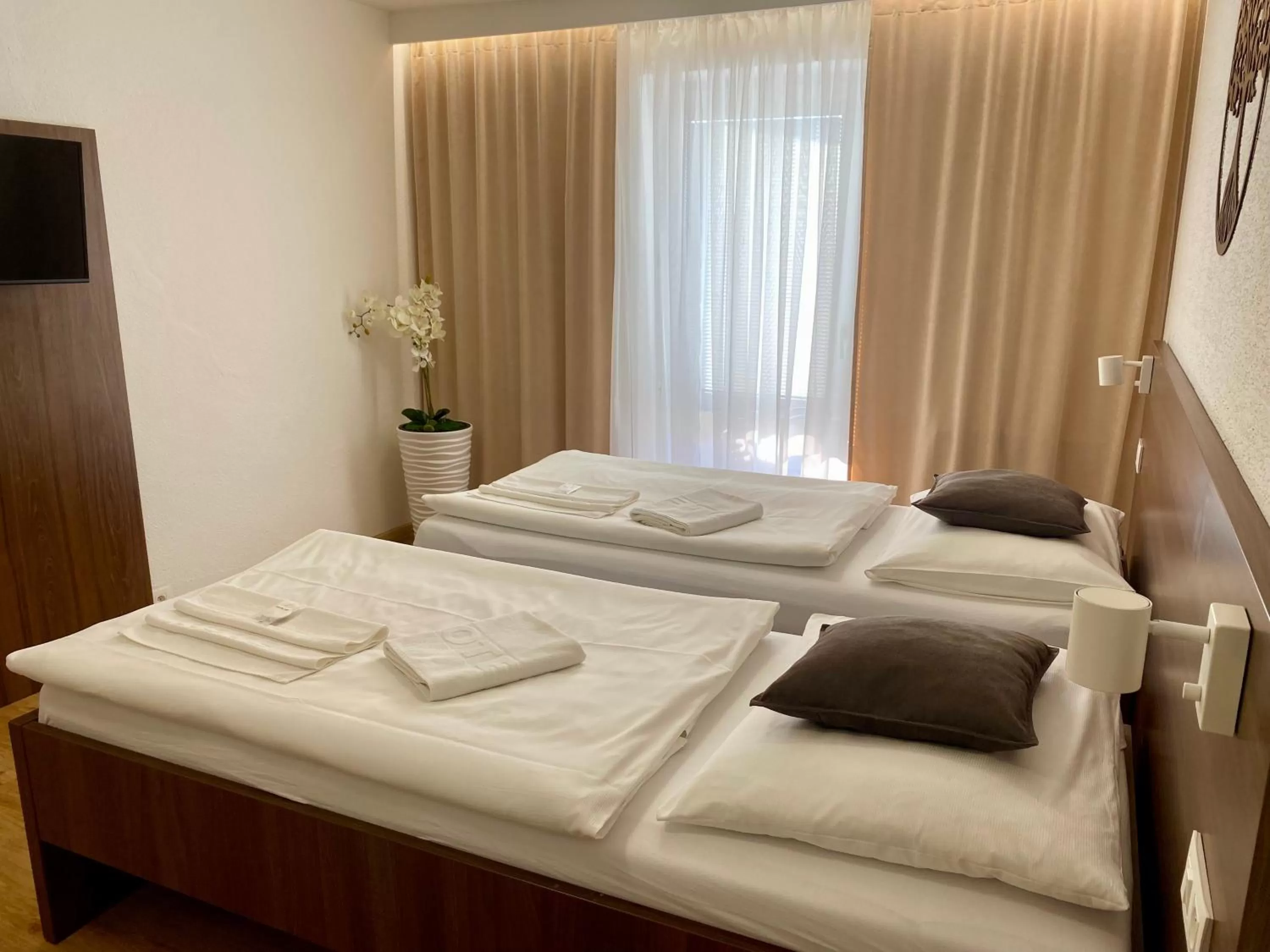 Photo of the whole room, Bed in WX Hotel