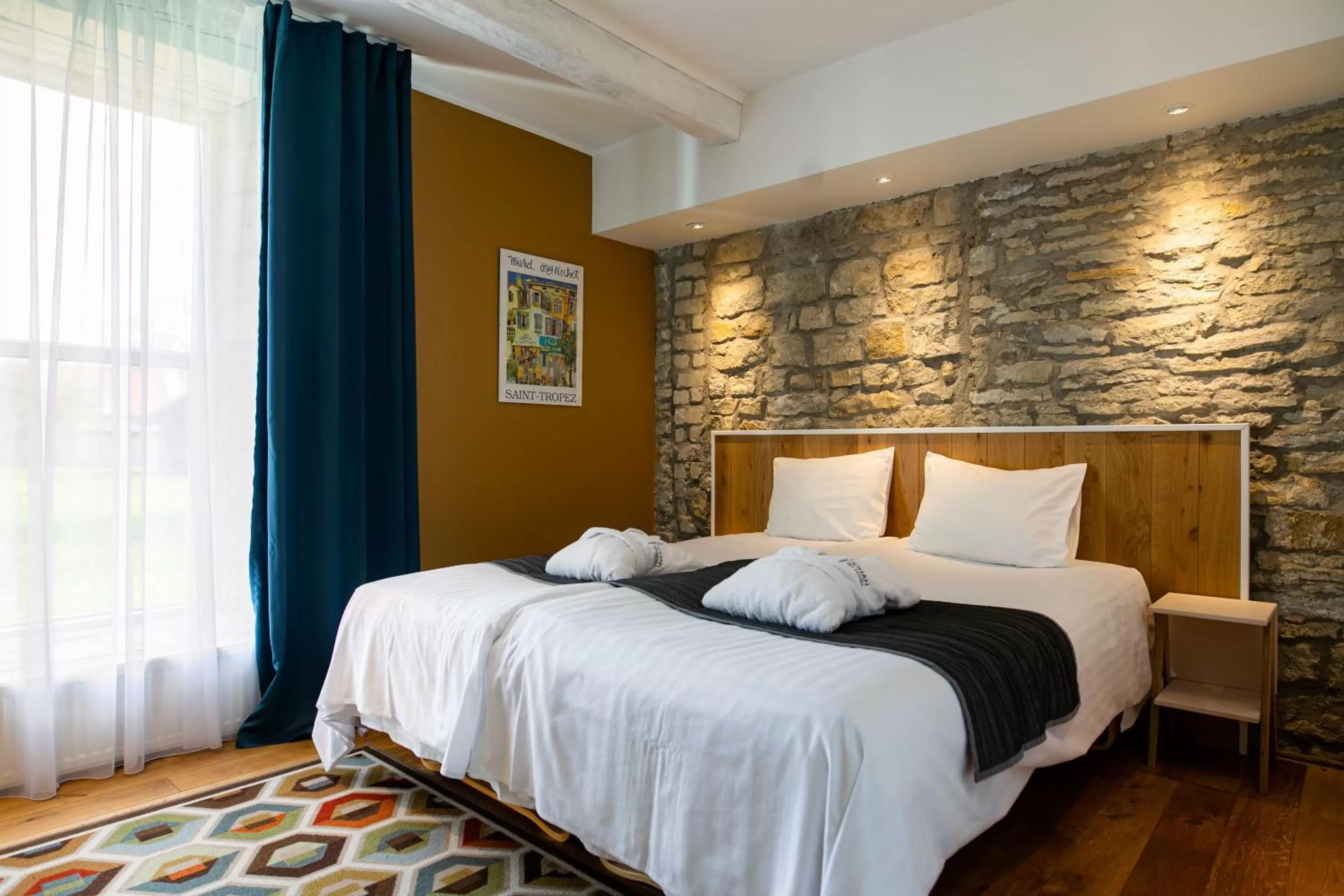 Bed in Johan Design & SPA Hotel