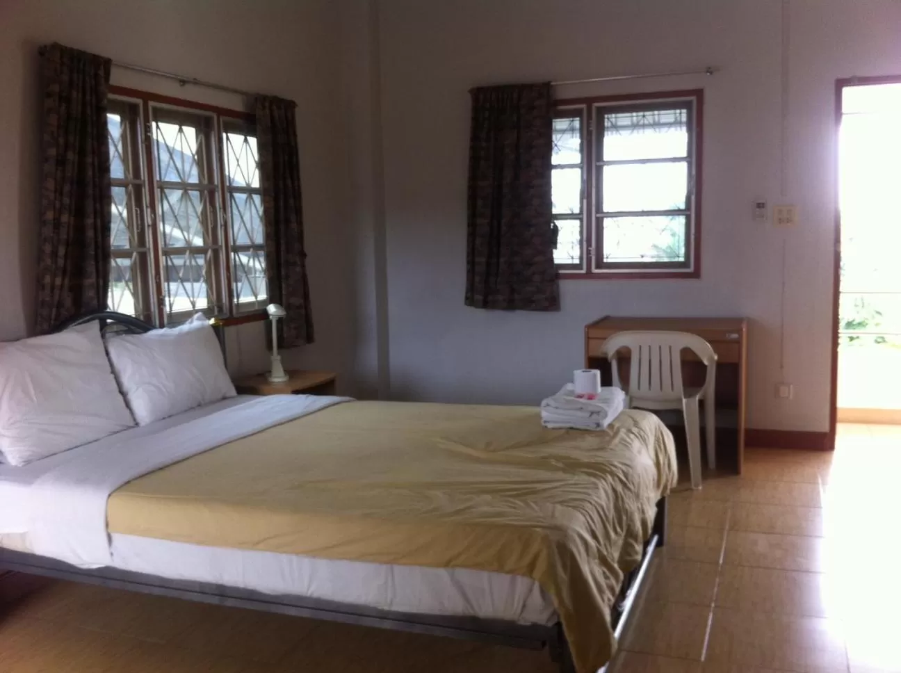 Bed in Pikul Apartment Hotel