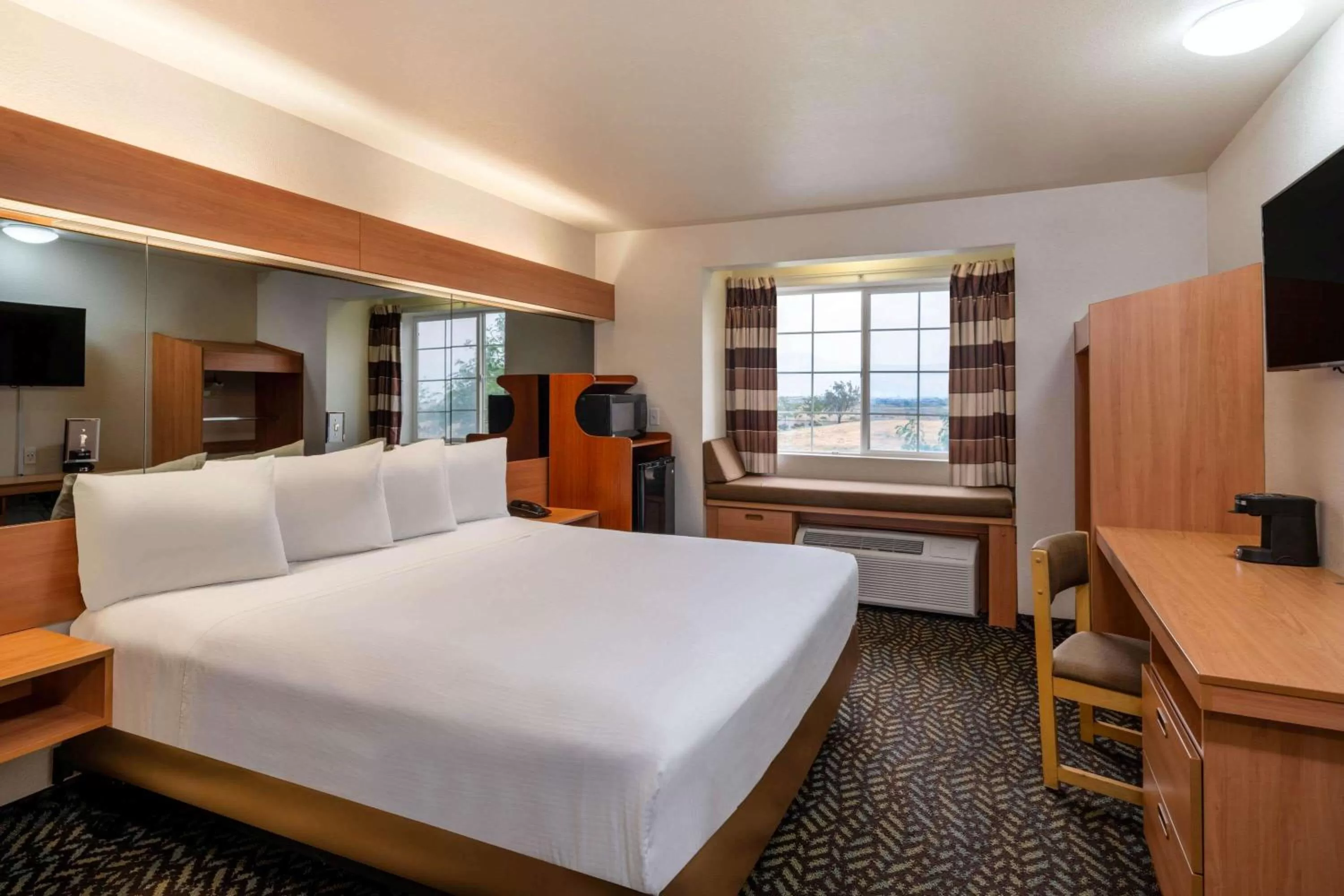 Photo of the whole room, Bed in Microtel Inn & Suites by Wyndham Salt Lake City Airport