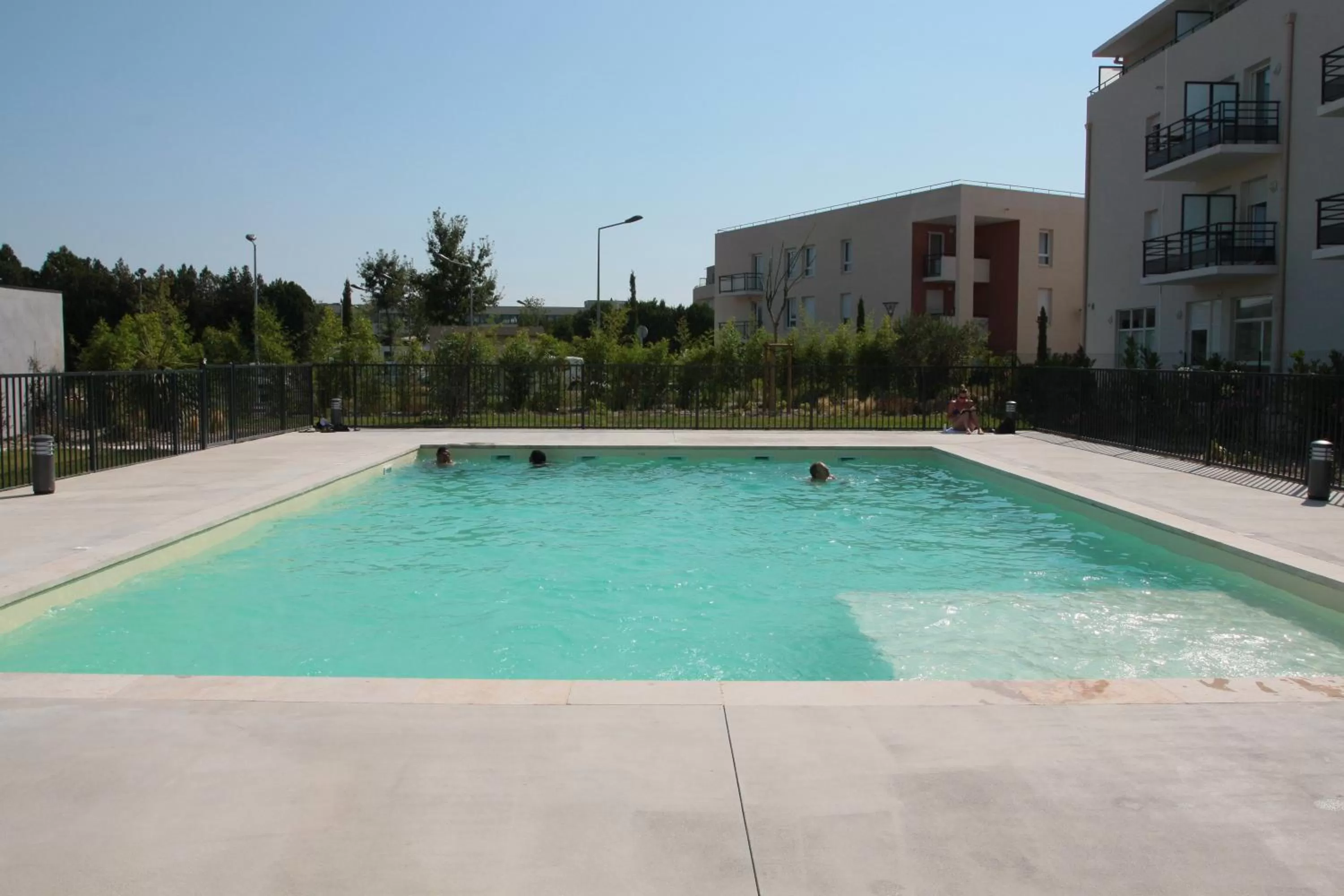 Swimming pool in KOSY Appart'Hôtels - Campus Del Sol Esplanade