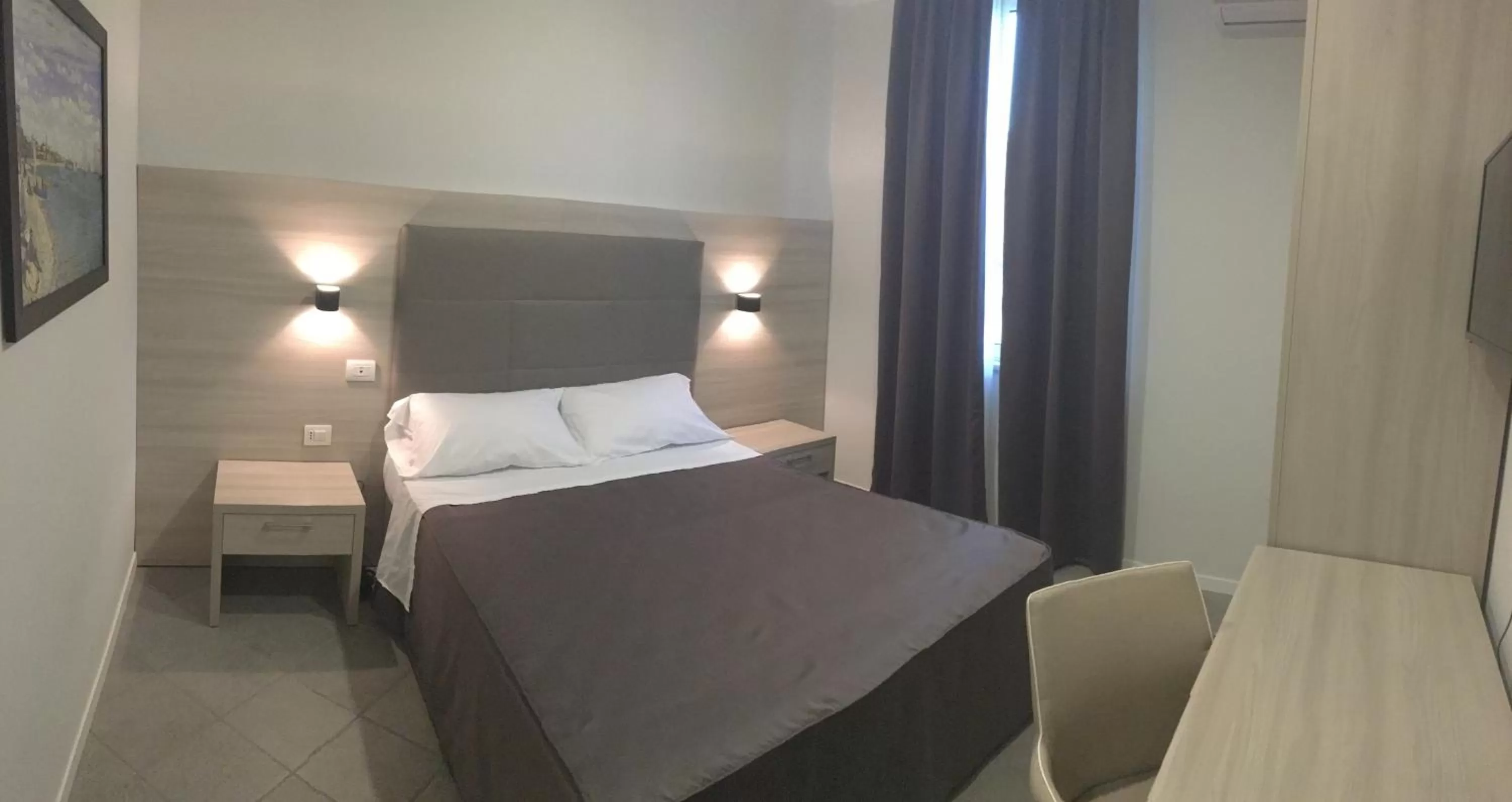 Bed in Academy Hotel