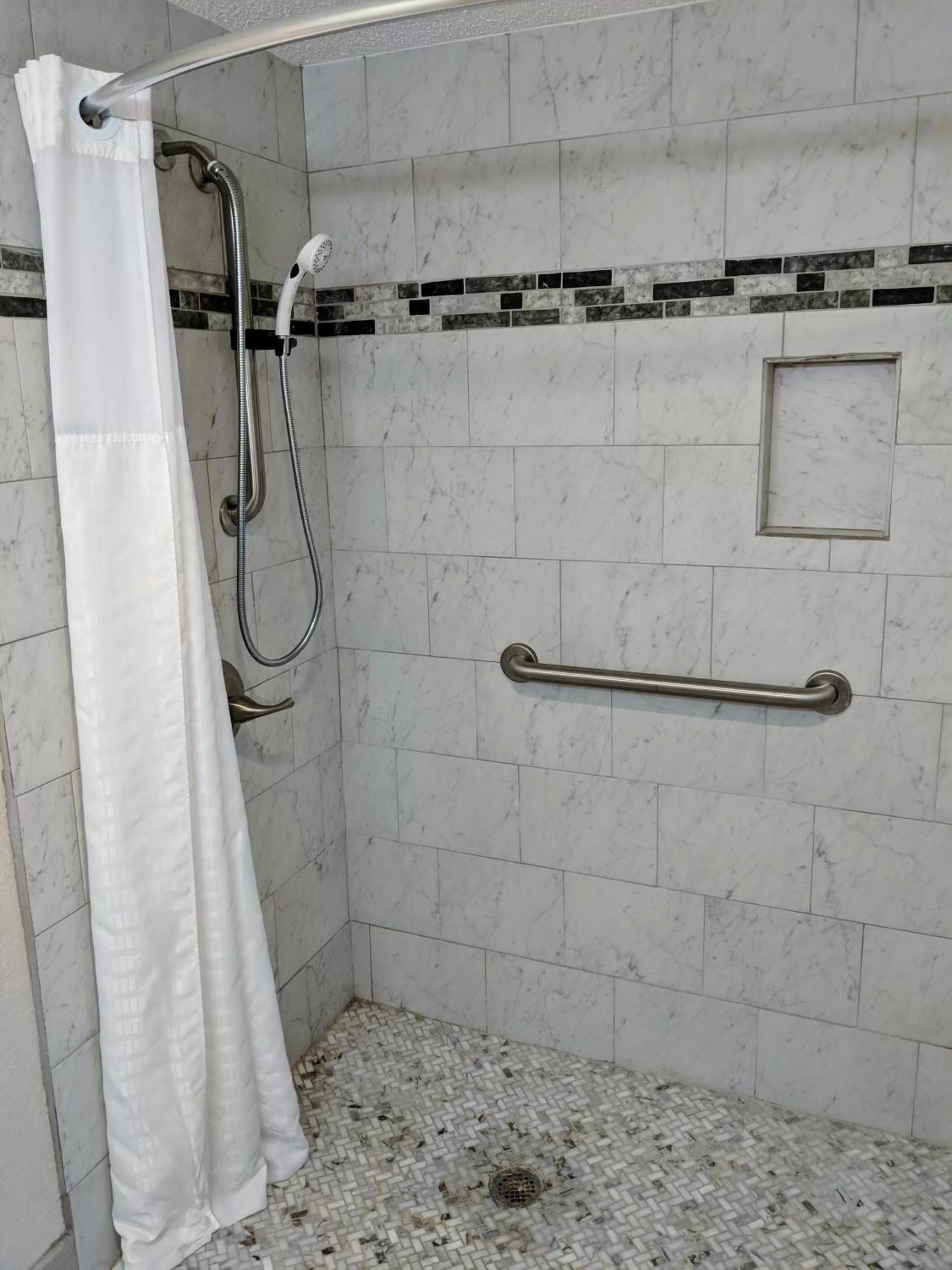 Bathroom in Super 8 by Wyndham Lake City