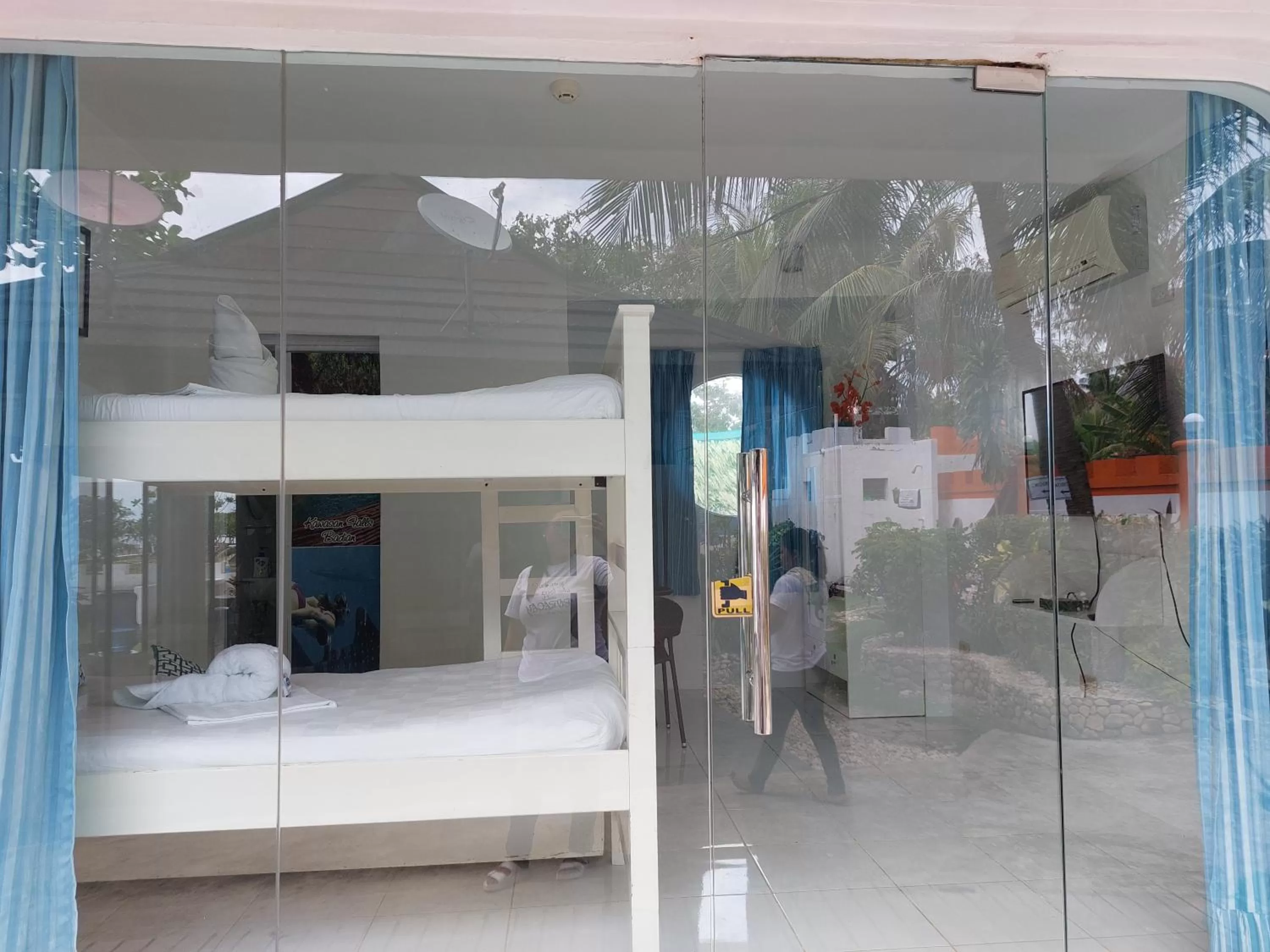 Bed in RRJ's BEACH RESORT