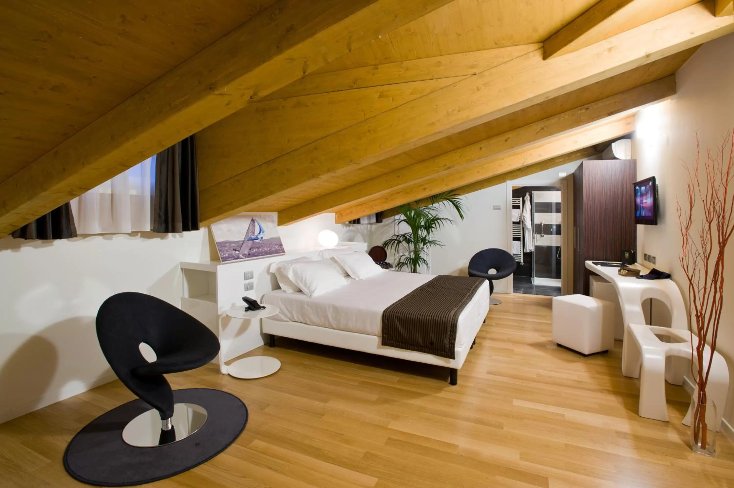 Photo of the whole room, Bed in Hotel Coppe Trieste - Boutique Hotel