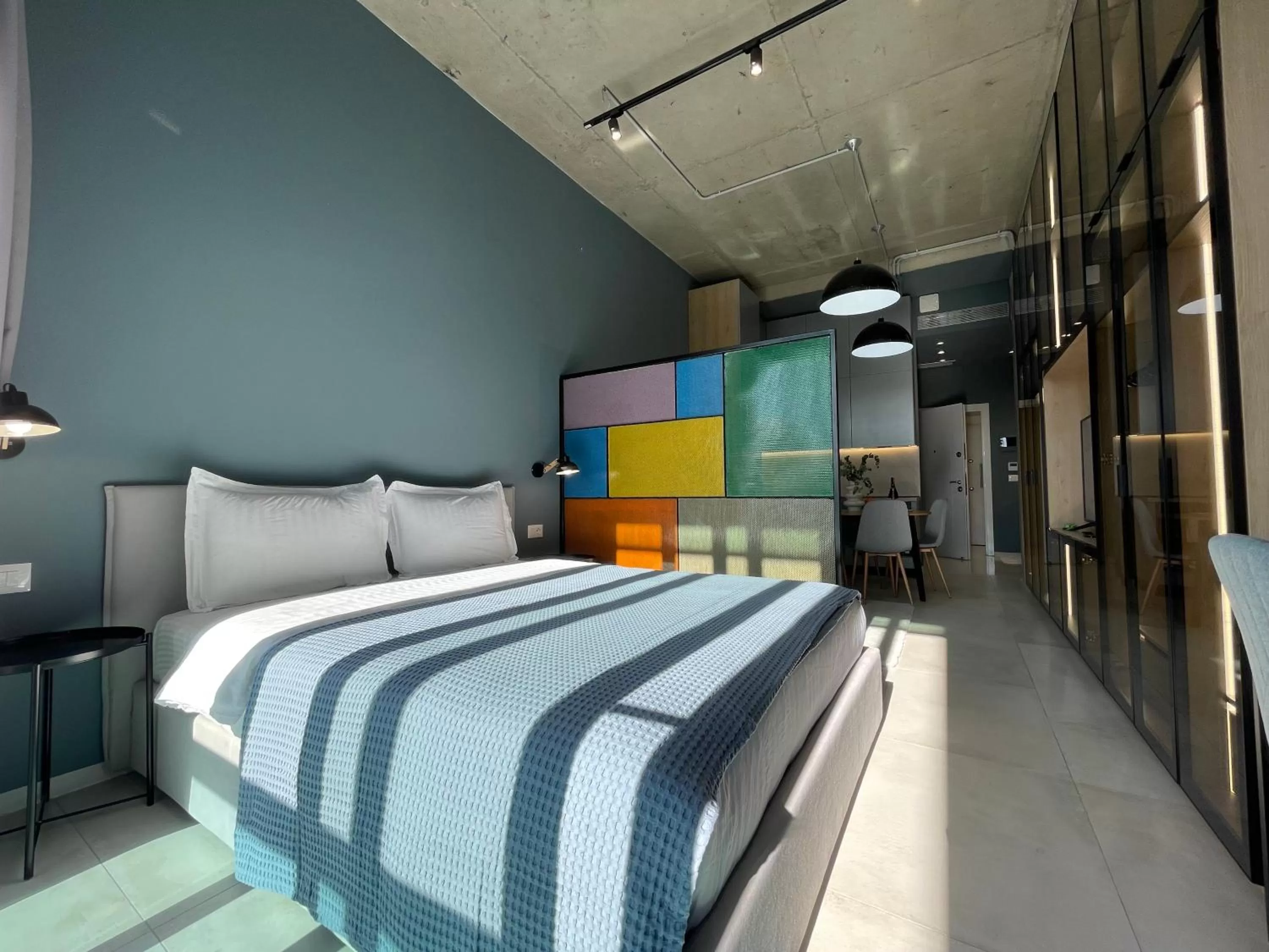 Bed in Ambassador Skyline Apartments