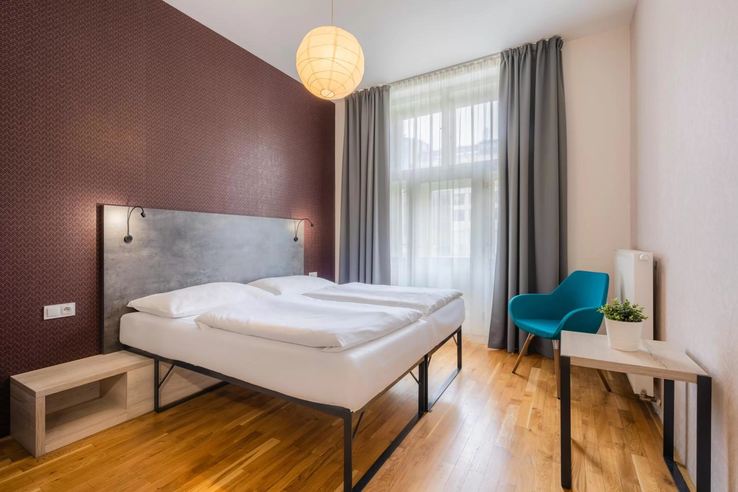 Bed in EA ApartHotel Melantrich