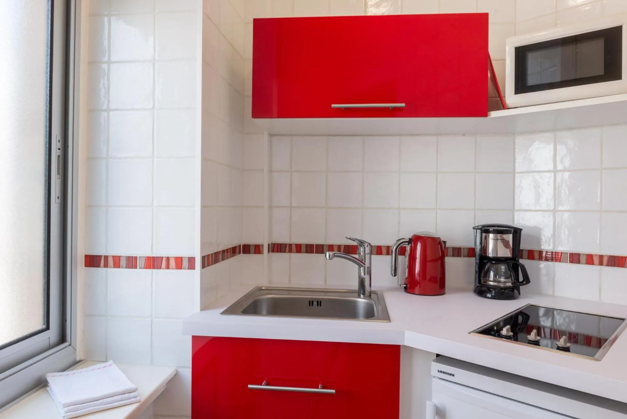 Kitchen or kitchenette in Hôtel de Perros, The Originals Boutique