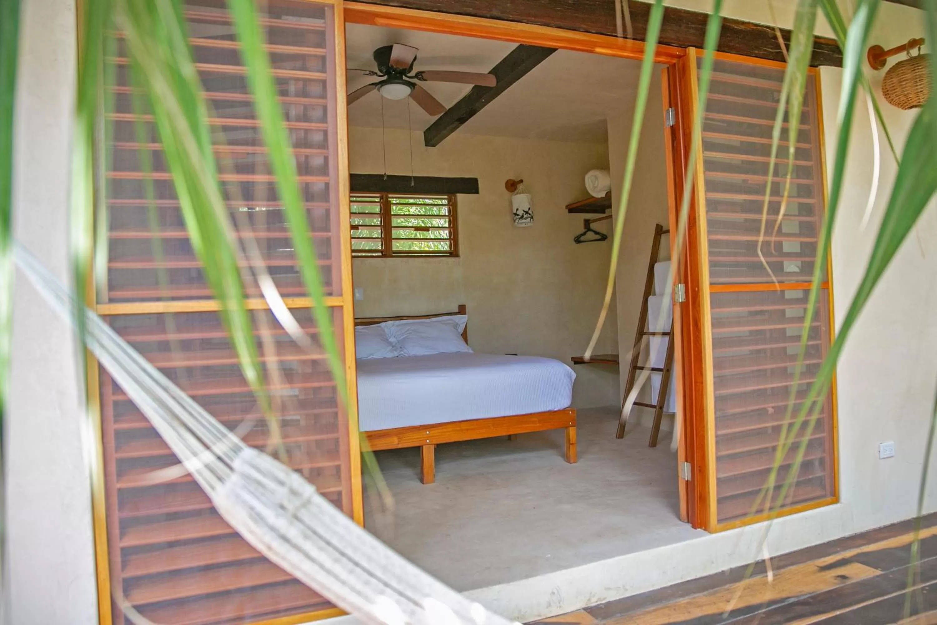 Bed in Hotel Buenavista Bacalar Jungle Experience