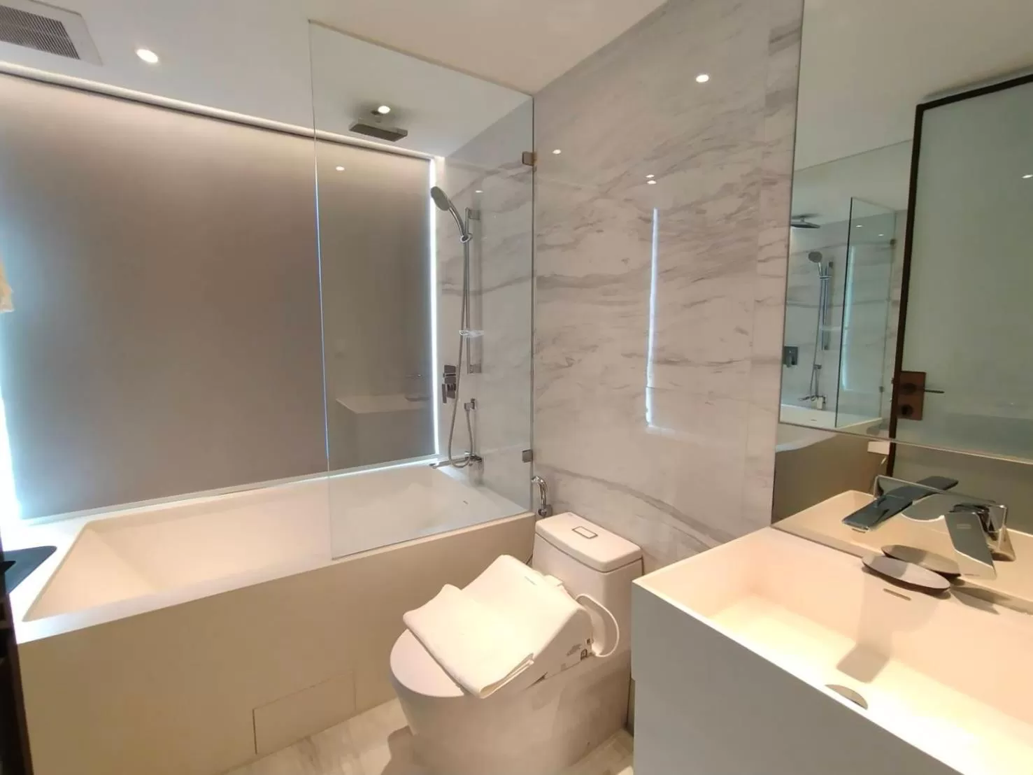 Bathroom in ashley hotel bkk