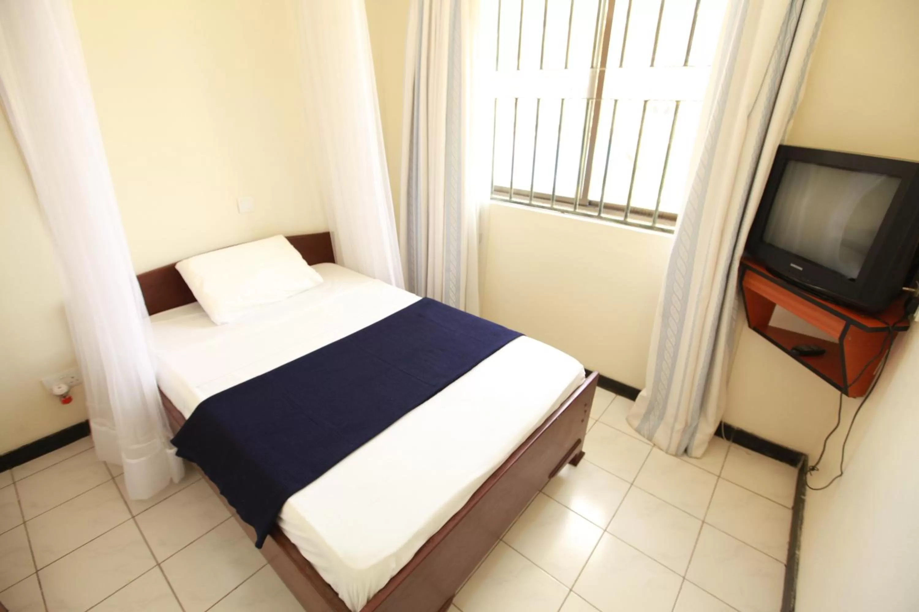 Bed in Coastgate Hotel