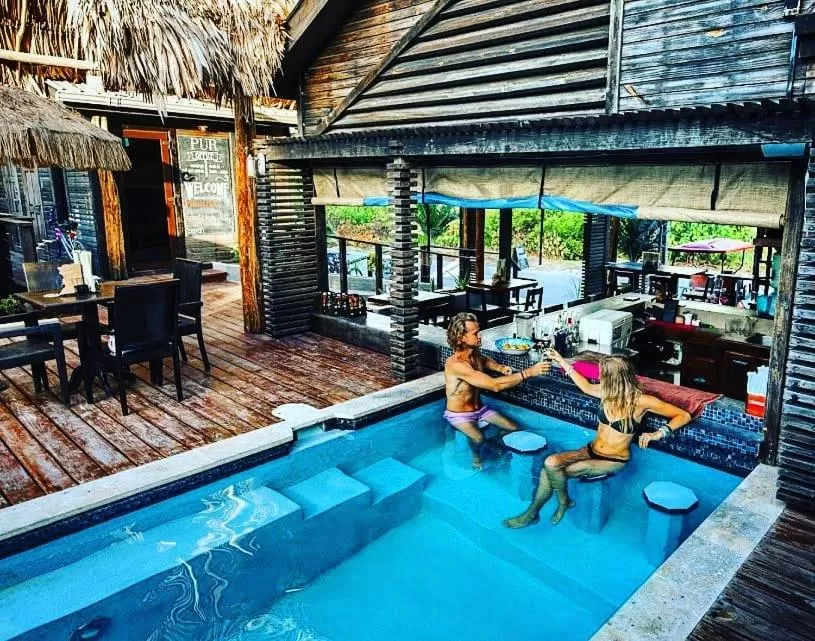 Patio, Swimming Pool in PUR Boutique Cabanas, Adults Only