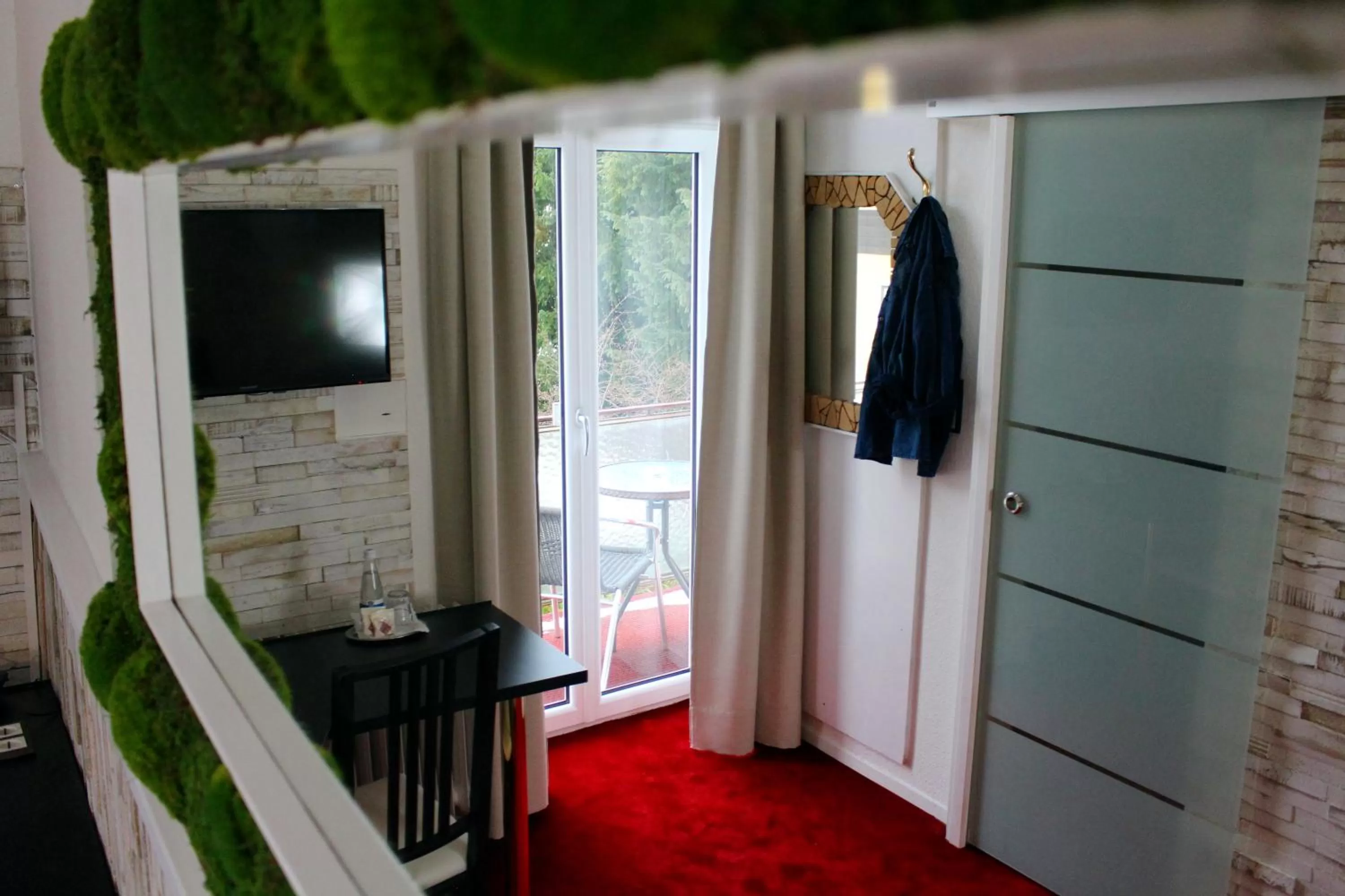 Photo of the whole room, TV/Entertainment Center in Hotel Almrausch