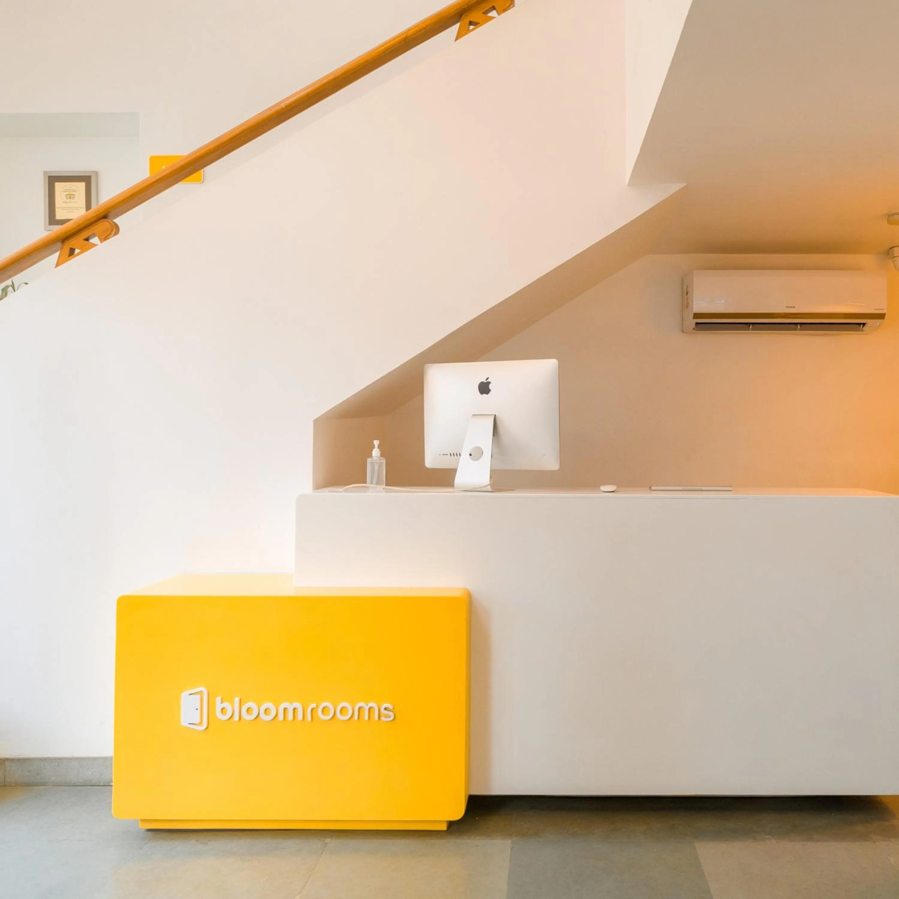 Property logo or sign in Bloomrooms @ New Delhi Railway Station