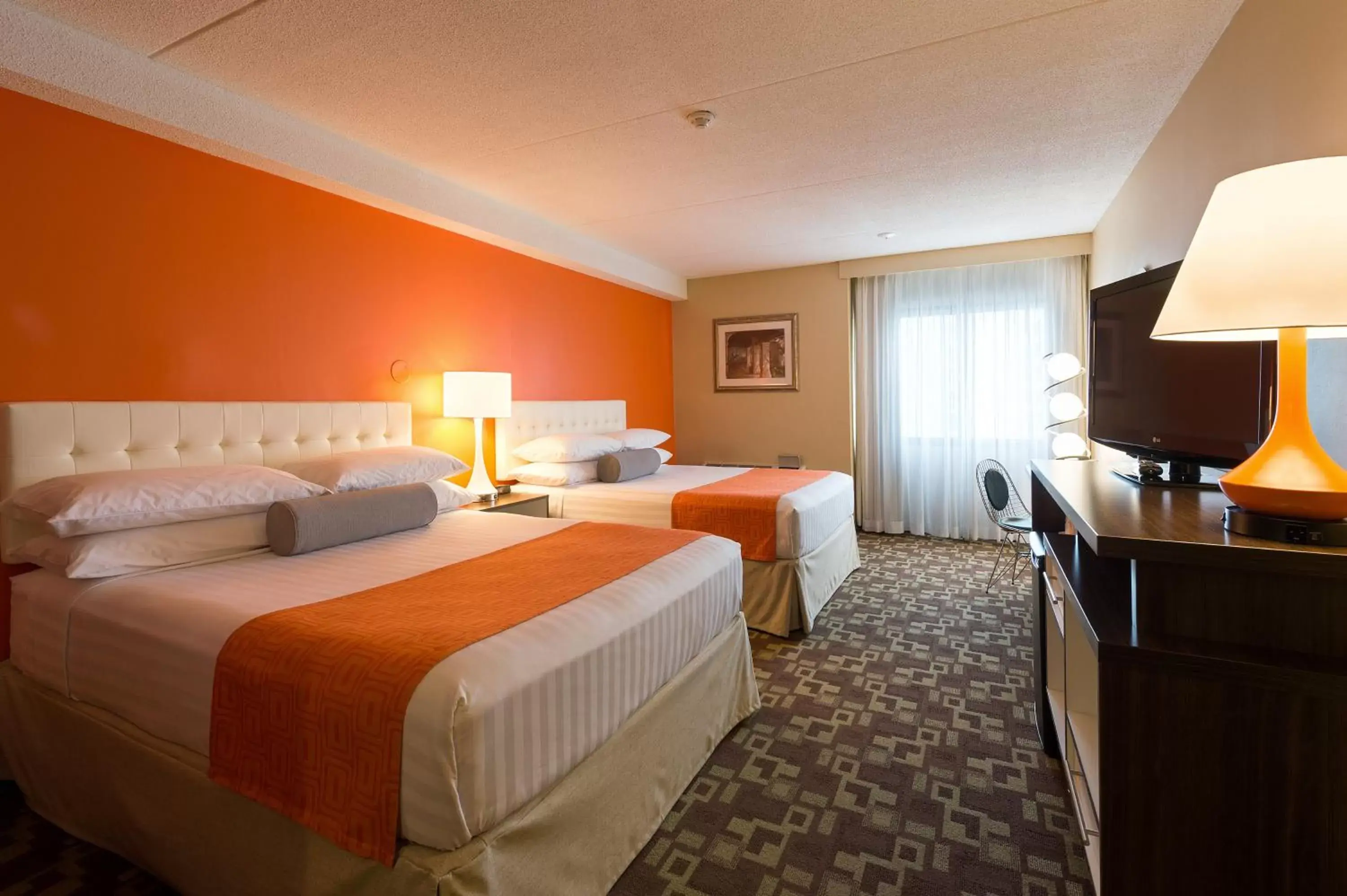 Family Suite with Three Queen Beds - Non-Smoking in Howard Johnson Plaza by Wyndham by the Falls Niagara Falls Family Suite with Three Queen Beds - Non-Smoking in Howard Johnson Plaza by Wyndham by the Falls Niagara Falls